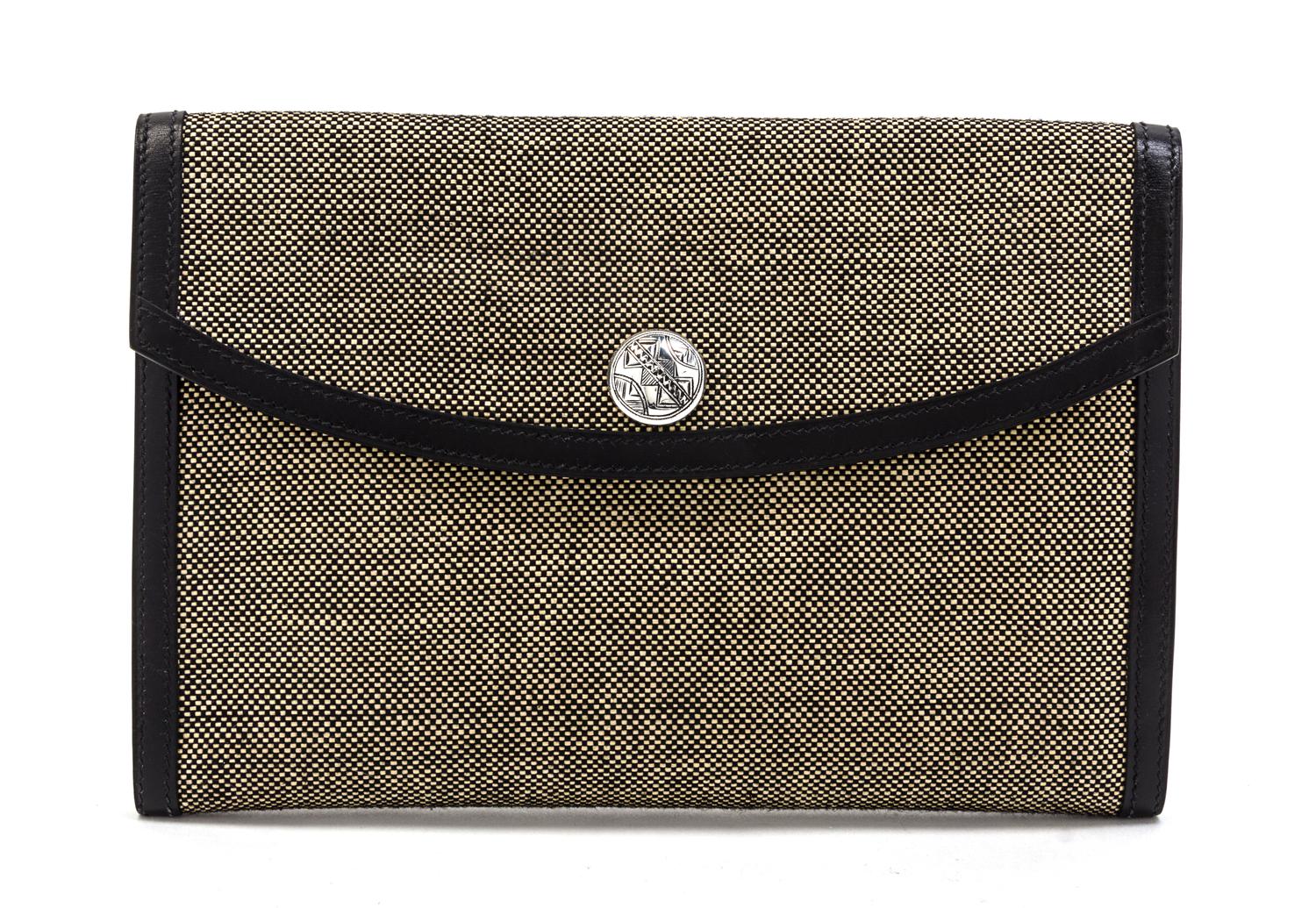 An Hermes Black and Ivory Woven Toile Clutch, 9 1/2 x 6 1/2 x 1 inches.