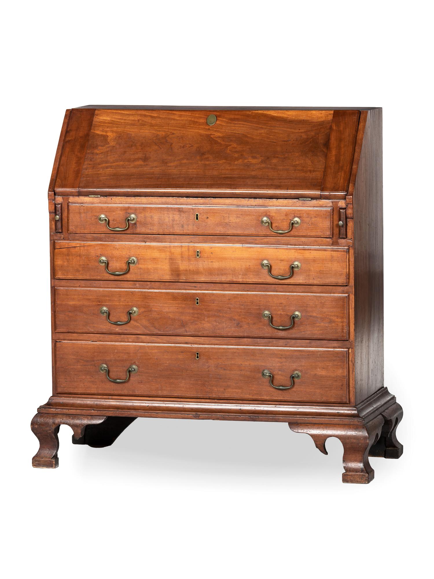 A Chippendale Carved Cherrywood Slant-Front Desk
