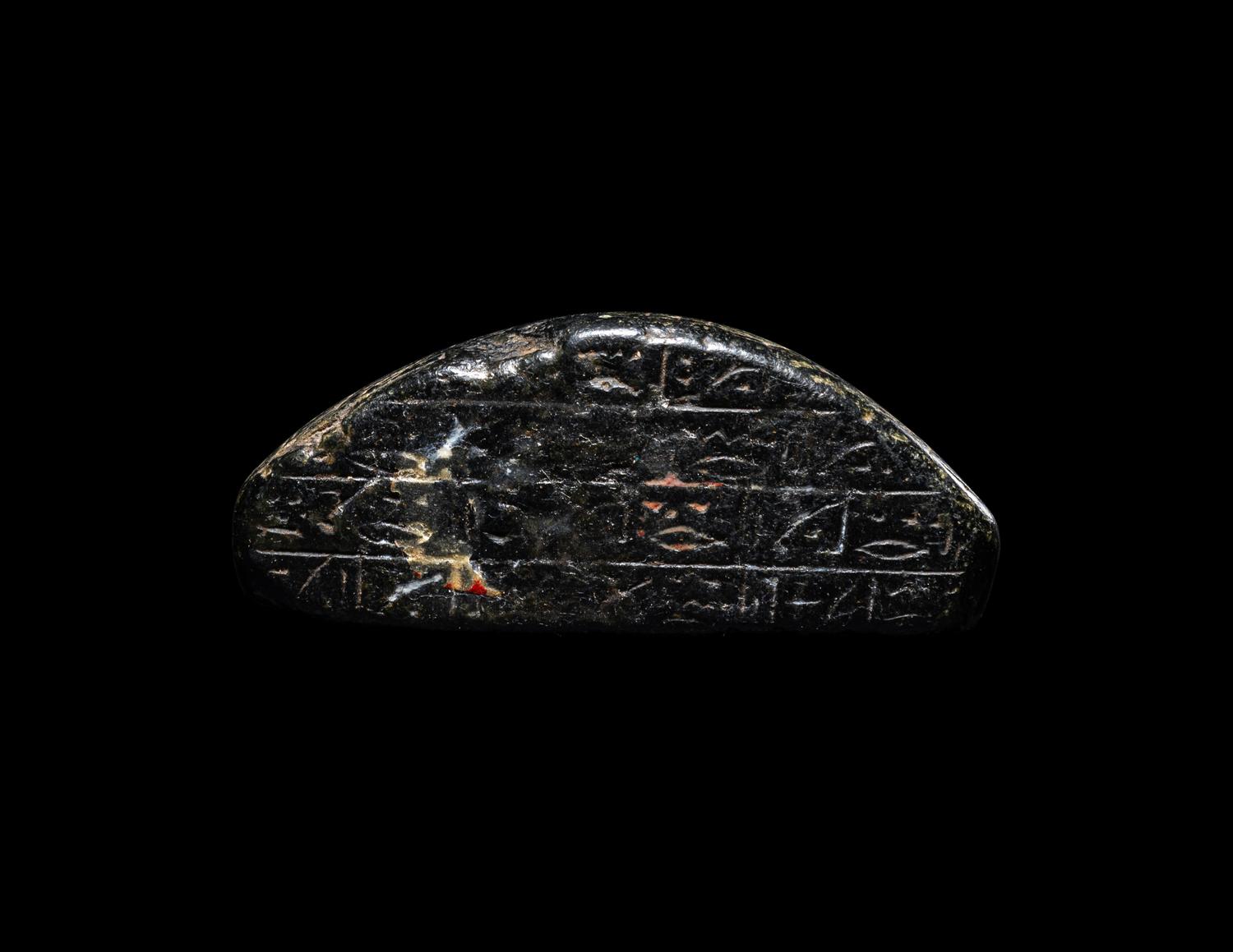 An Egyptian Black Stone Cippus of Horus