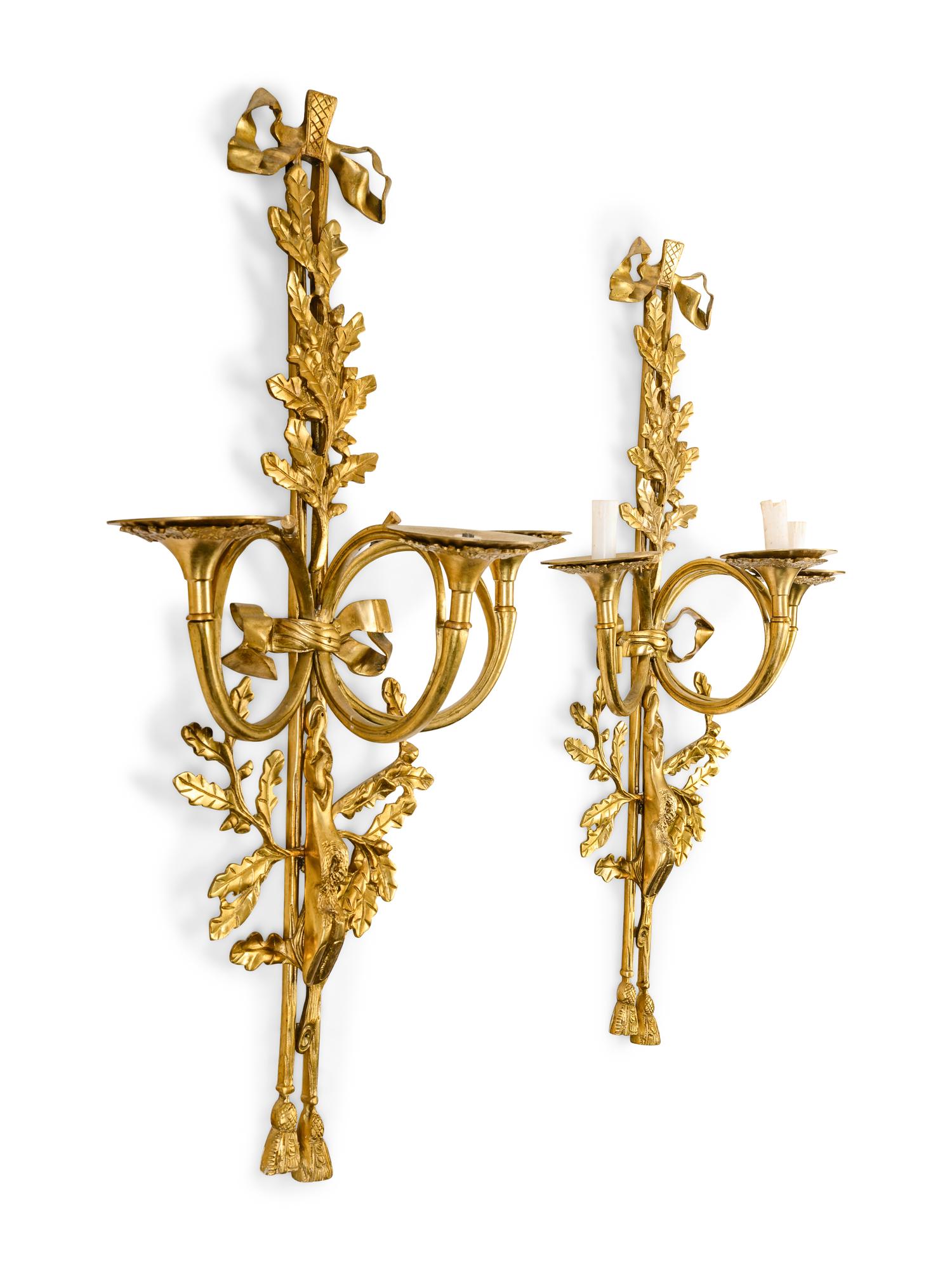 A Pair of Louis XVI Style Gilt Metal Three-Light Wall Sconces