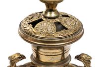 A Pair of Continental Gilt Metal Candlesticks
