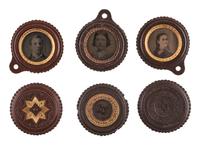 [EARLY PHOTOGRAPHY]. A group of 3 brown fob "oreo" cases containing tintype portraits, including:
