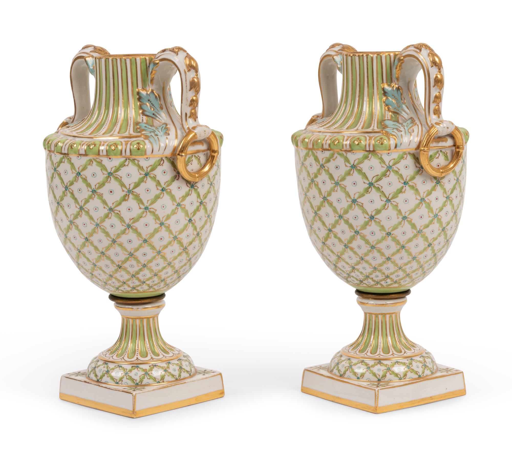 A Pair of Sèvres Style Porcelain Urns