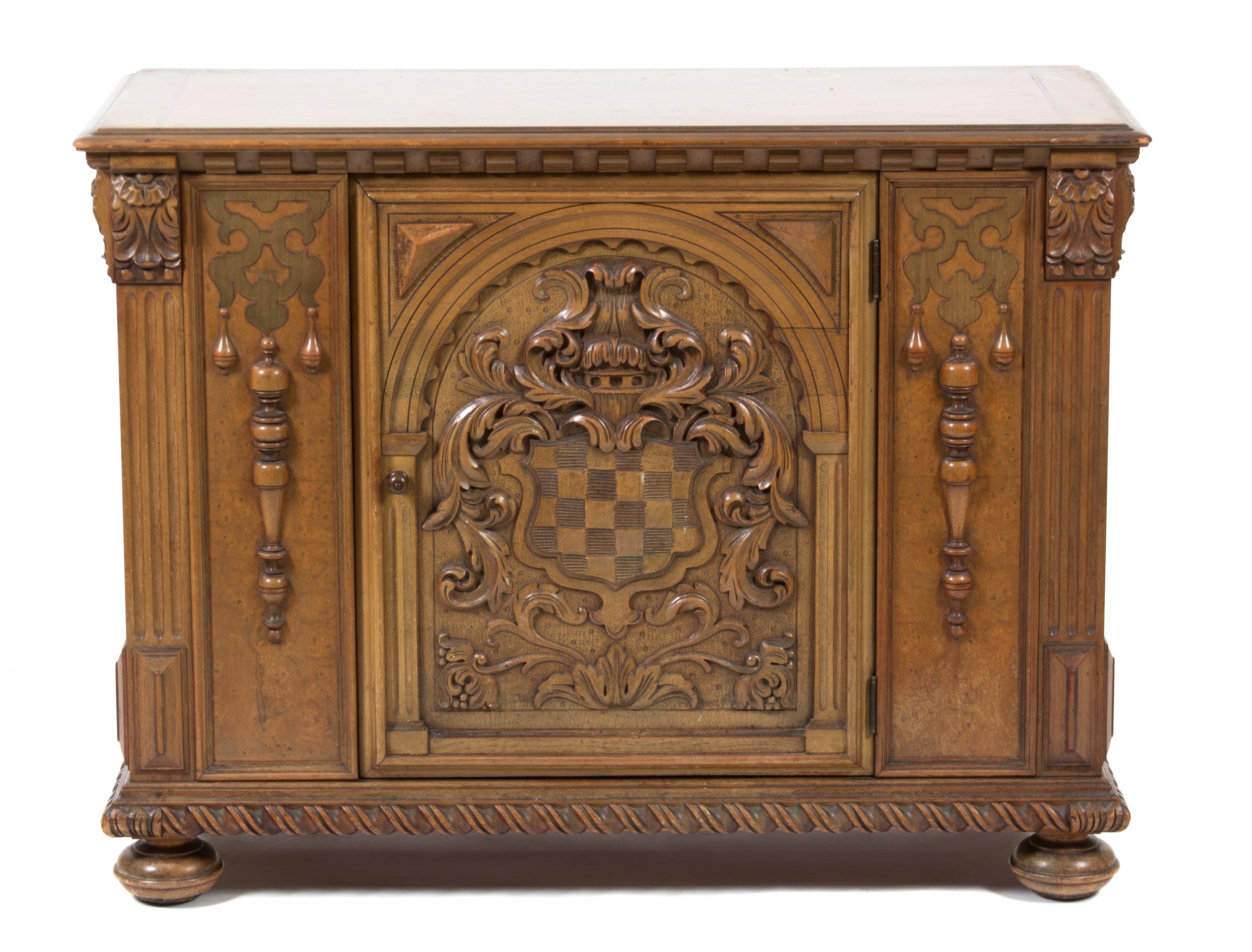 A Renaissance Revival Style Carved Walnut Side Cabinet Height 33 1/4 x width 44 x depth 19 inches. — 20TH CENTURY