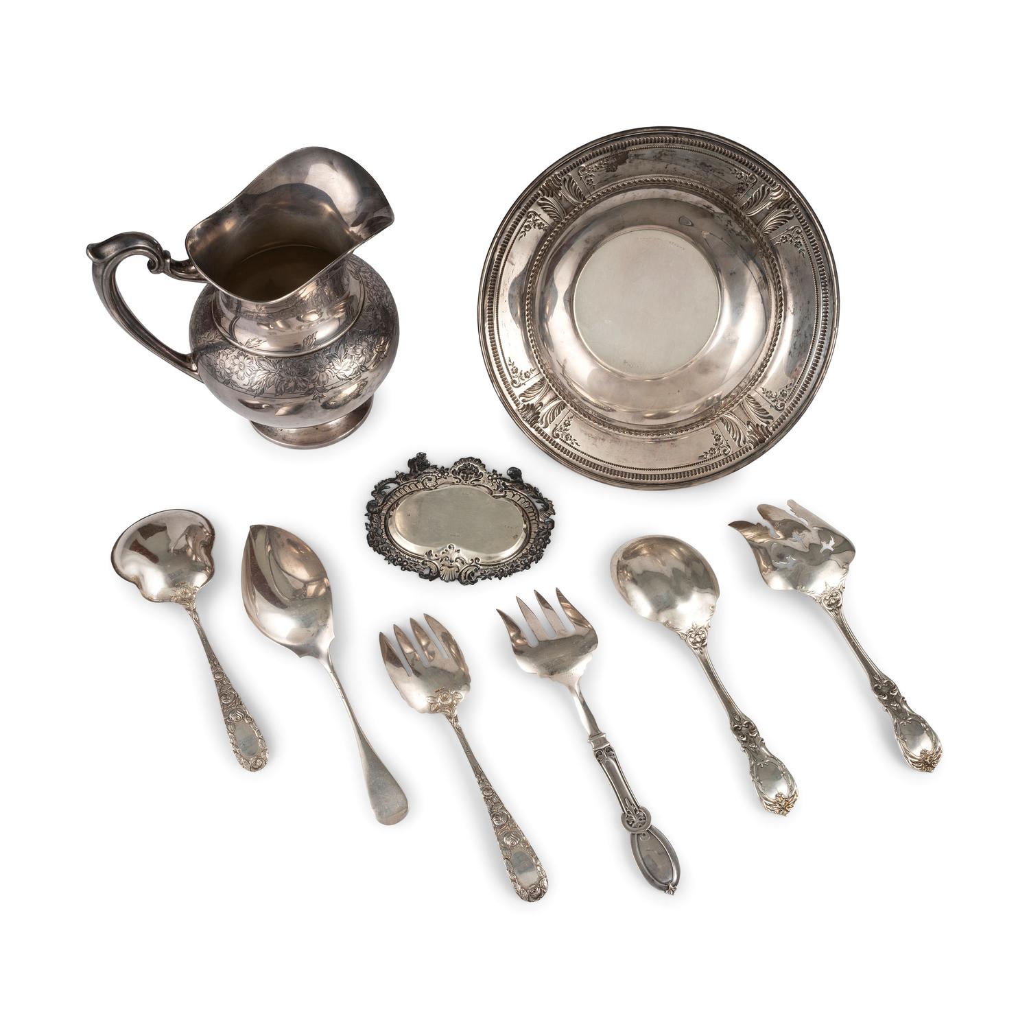 A Collection of Silver Serving Wares