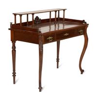 A Victorian Mahogany Lady's Writing Table with Shelf