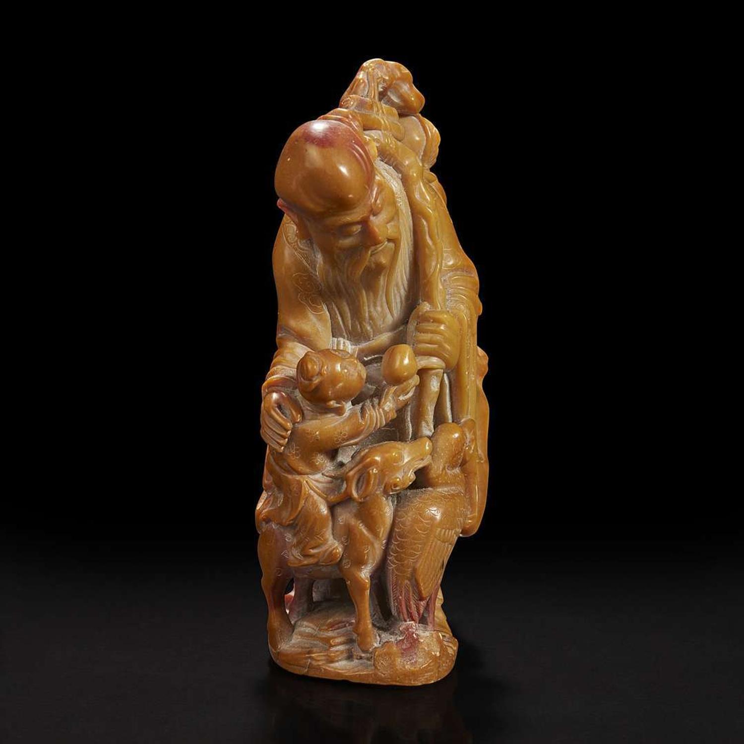 A Chinese carved soapstone figure of Shoulao 寿山石雕寿老