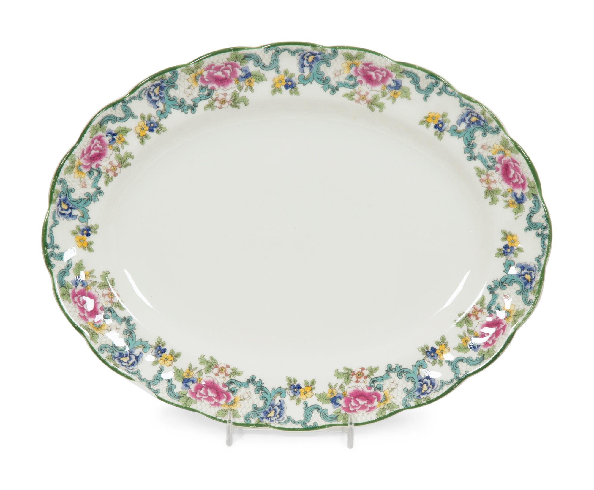 A Royal Doulton Floradora Green Porcelain Dinner Service