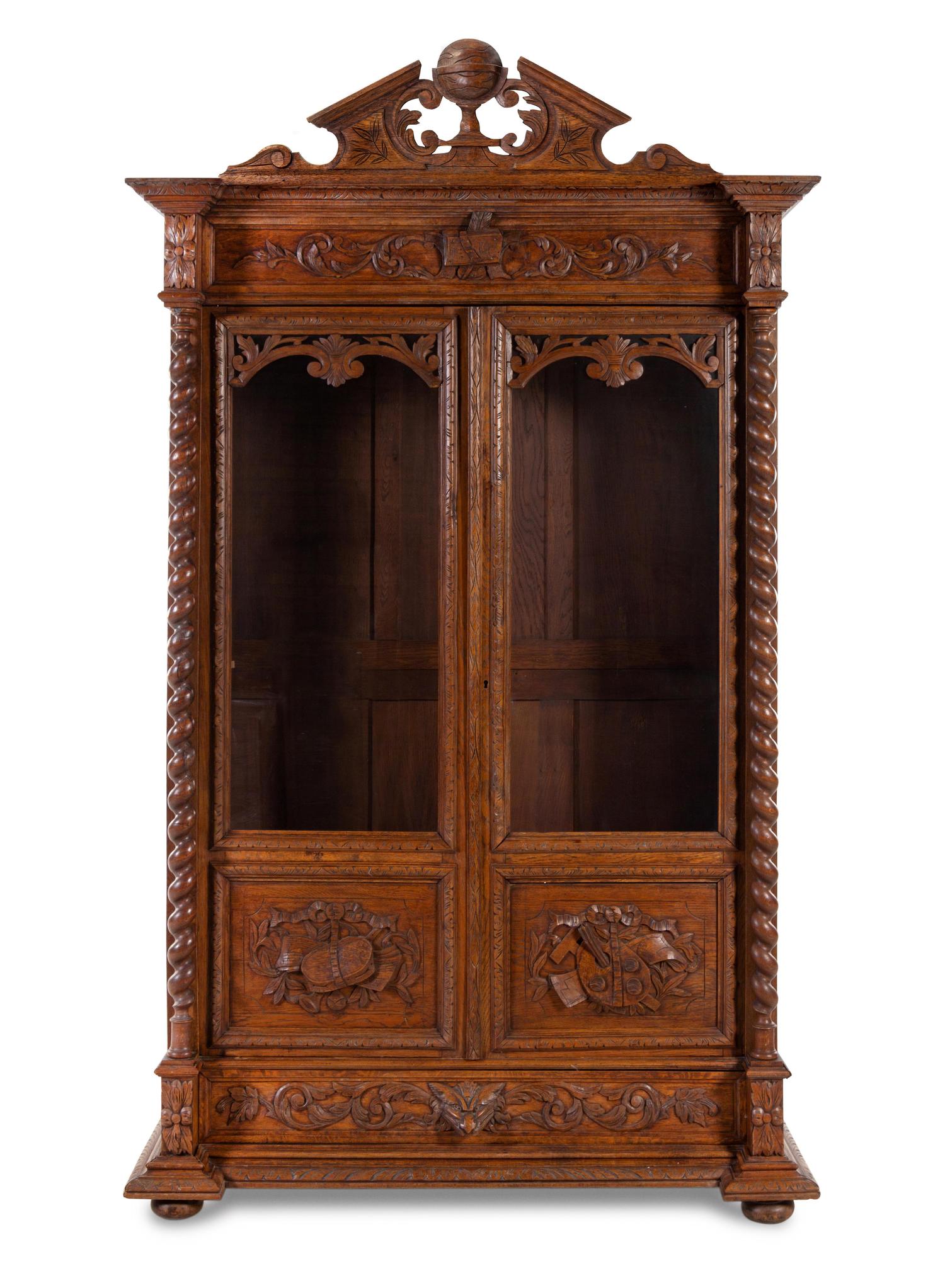 A Renaissance Revival Carved Oak Armoire