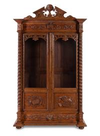 A Renaissance Revival Carved Oak Armoire