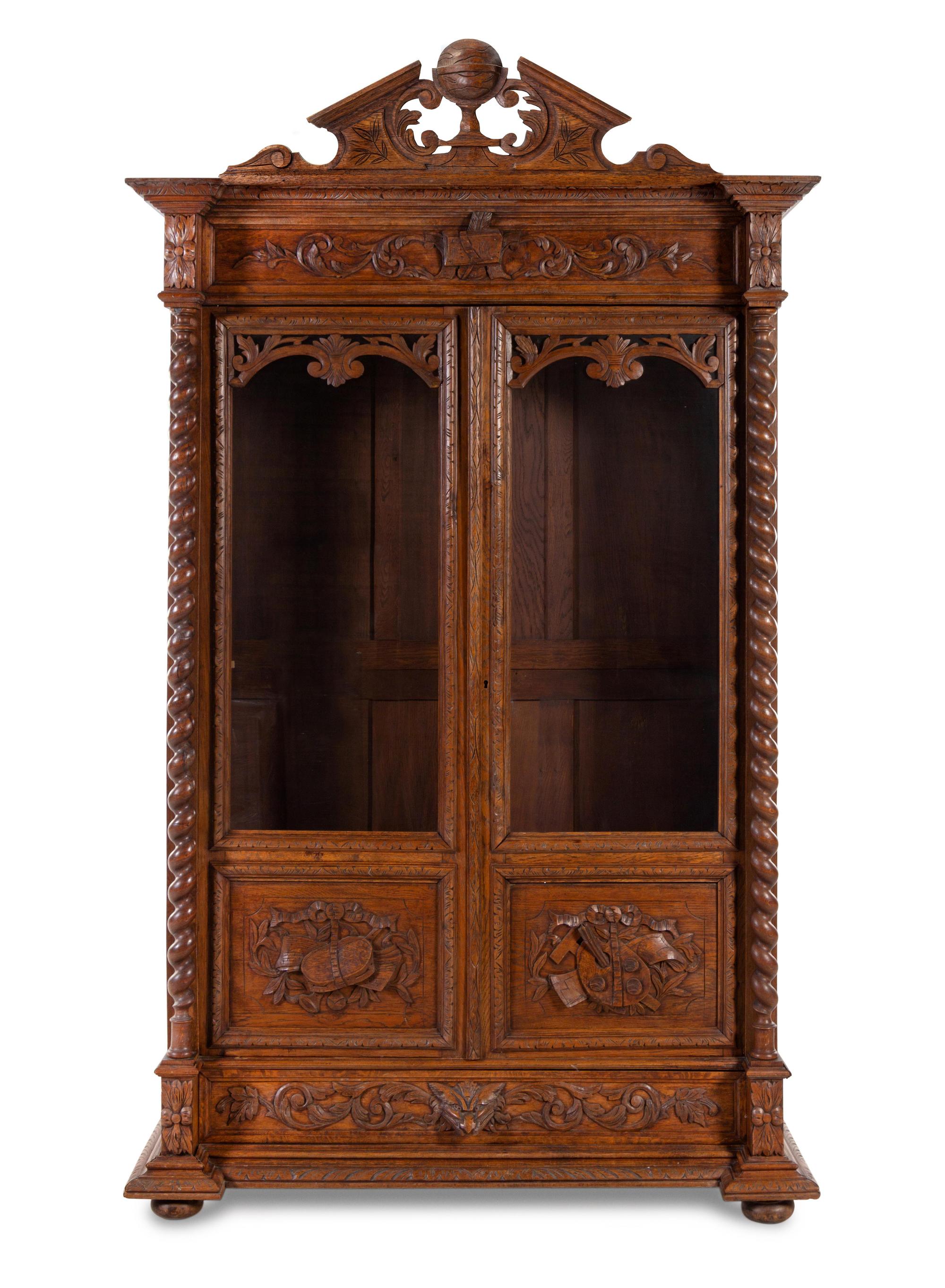 A Renaissance Revival Carved Oak Armoire