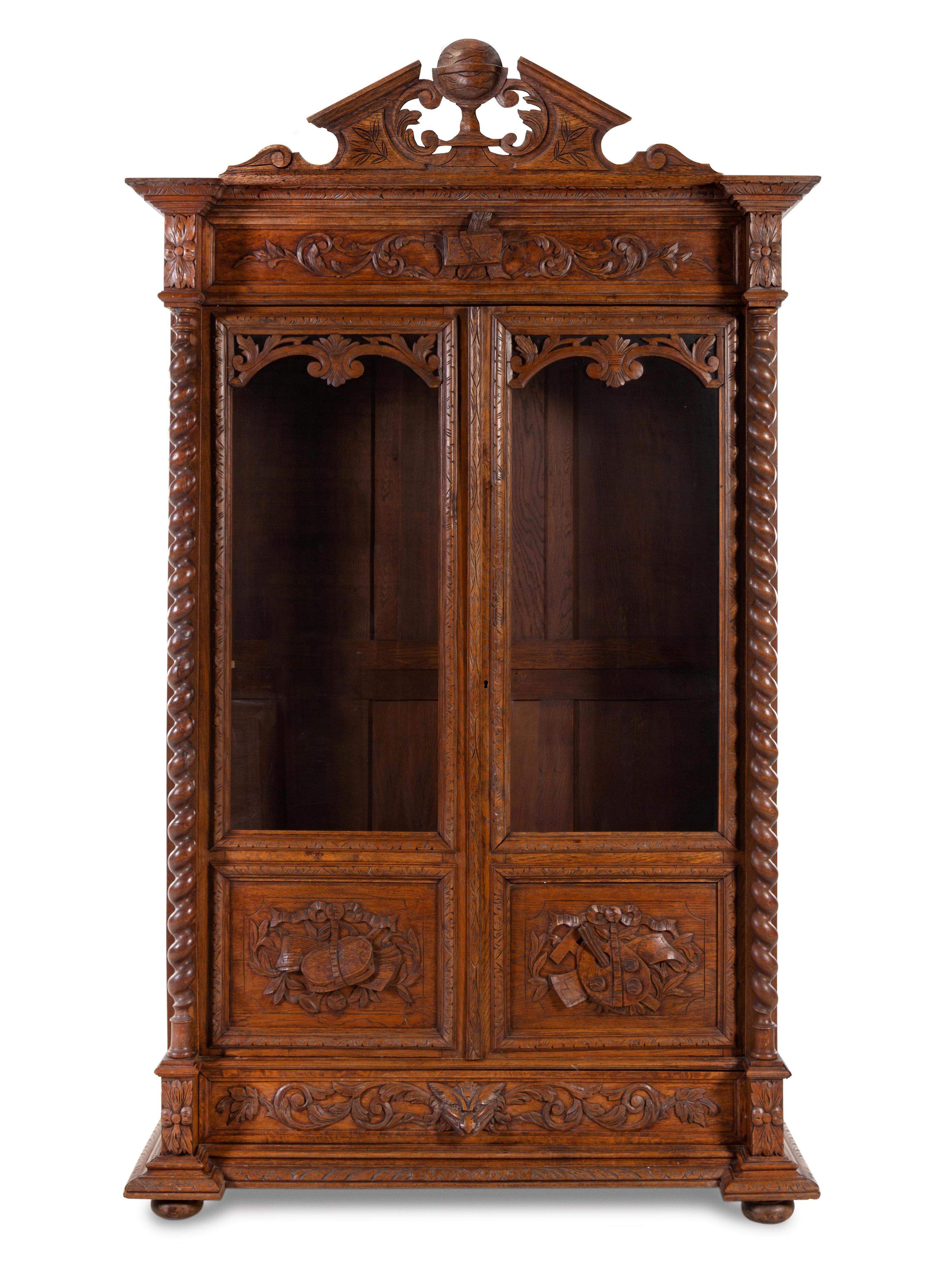 A Renaissance Revival Carved Oak Armoire