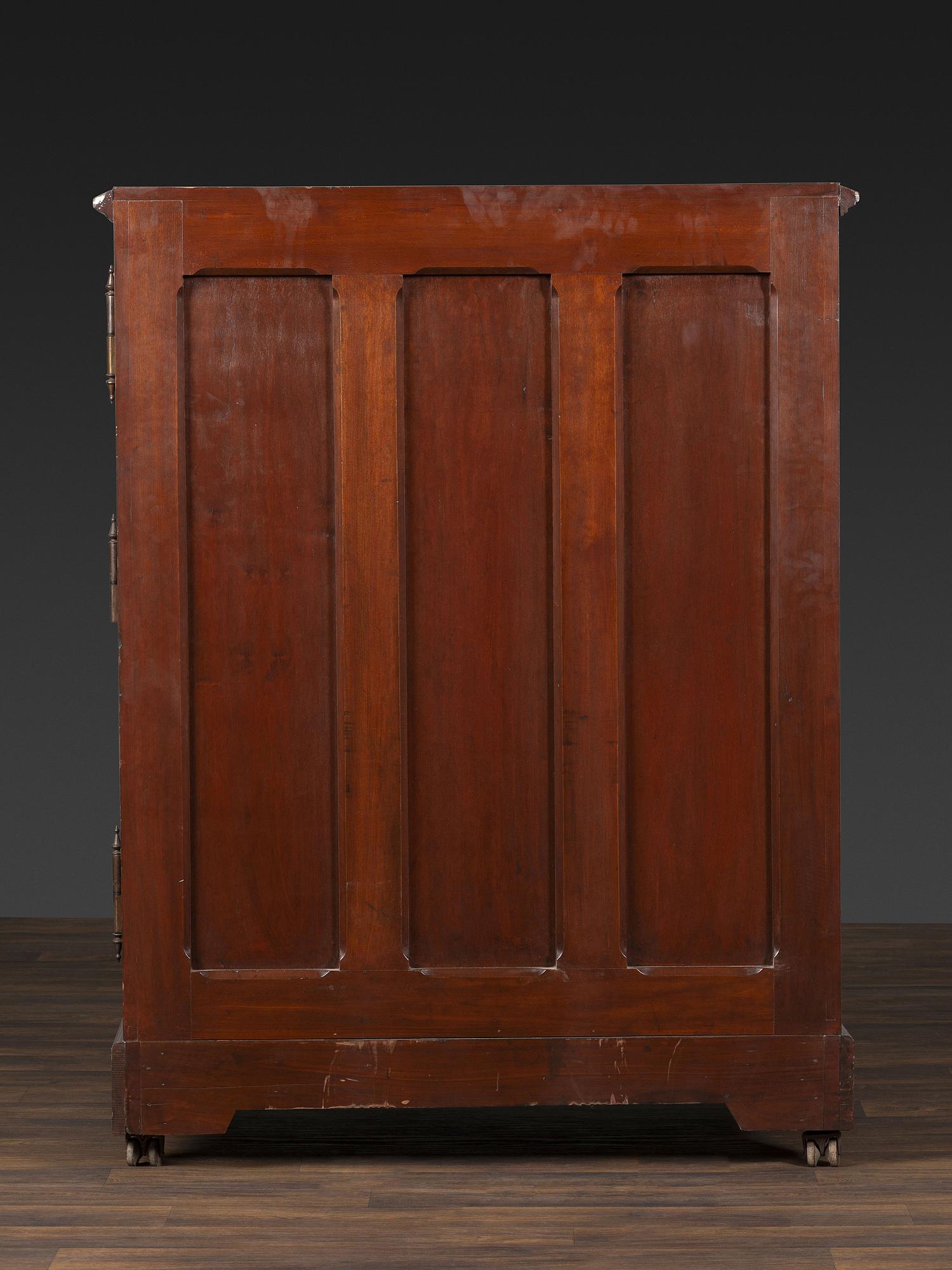 A Carved Walnut Wooton Secretary Desk