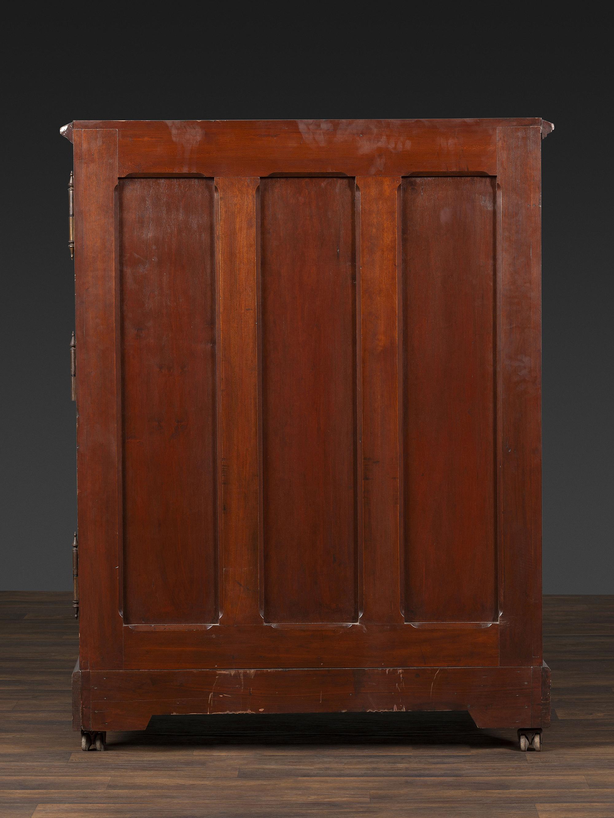 A Carved Walnut Wooton Secretary Desk