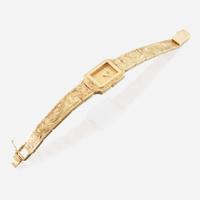 A gold bracelet watch and matching earrings, Seiko