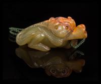 A Carved Jade Toggle Length 2 1/8 inches.