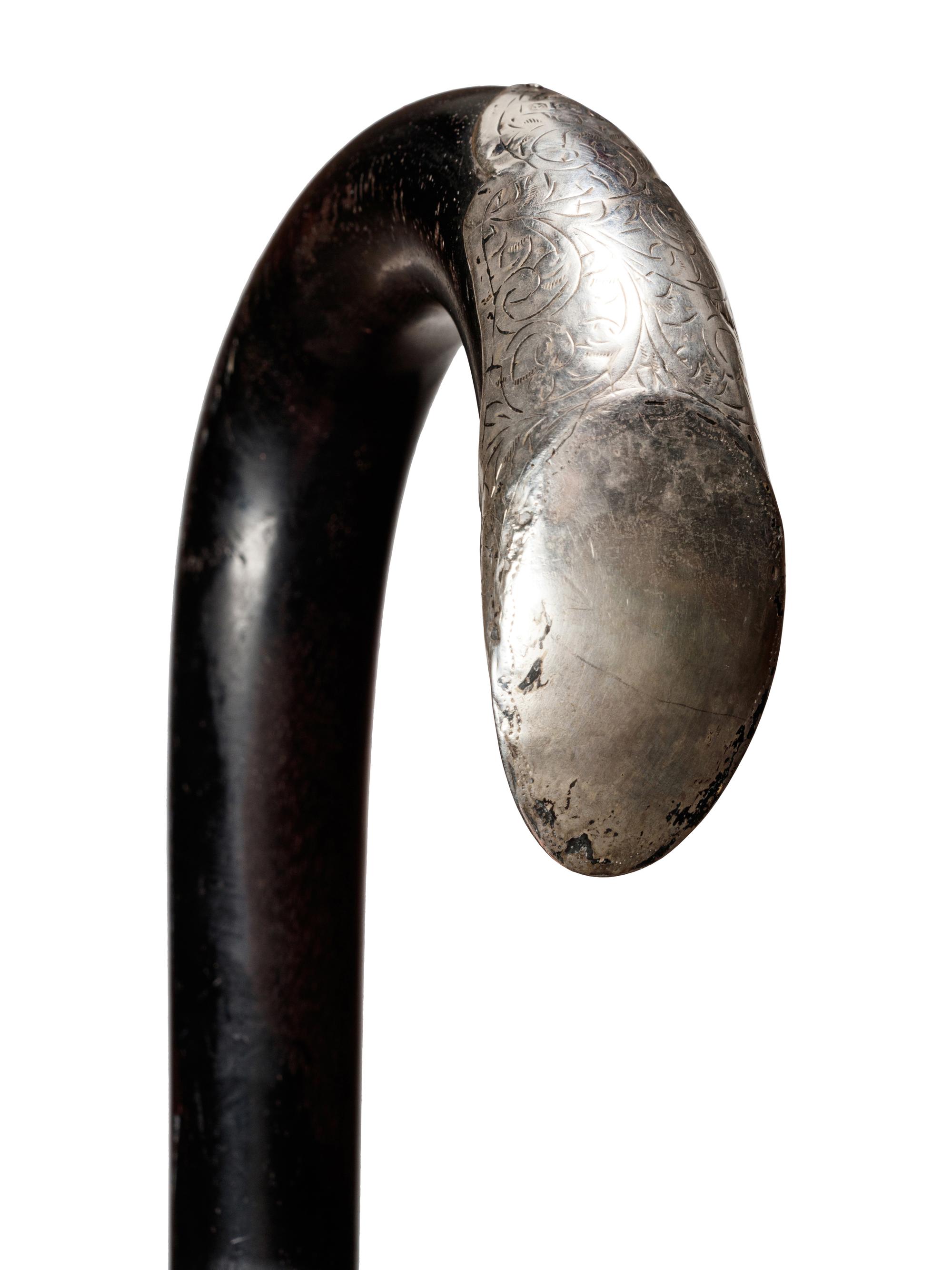 An English Silver Mounted Ebony Walking Stick