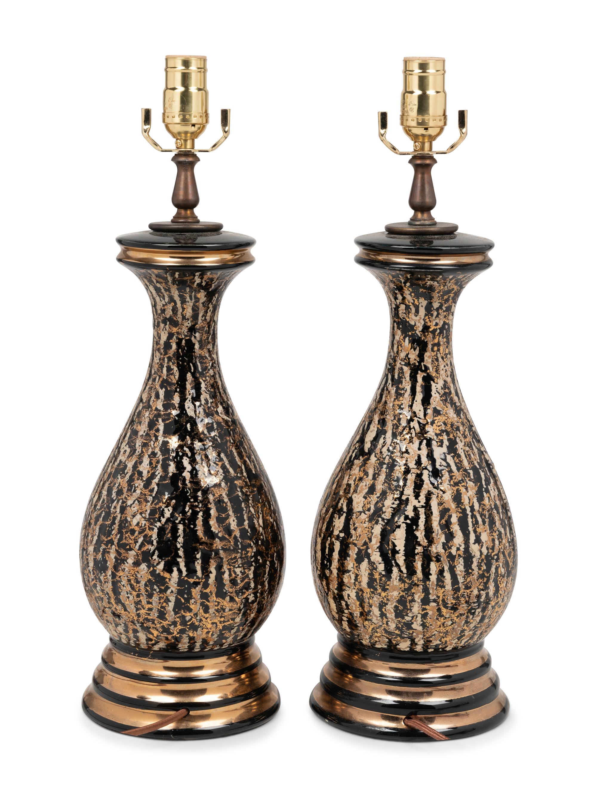A Pair of Glazed Pottery Vases Mounted as Lamps