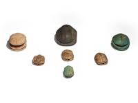 Seven Egyptian Faience and Stone Scarabs