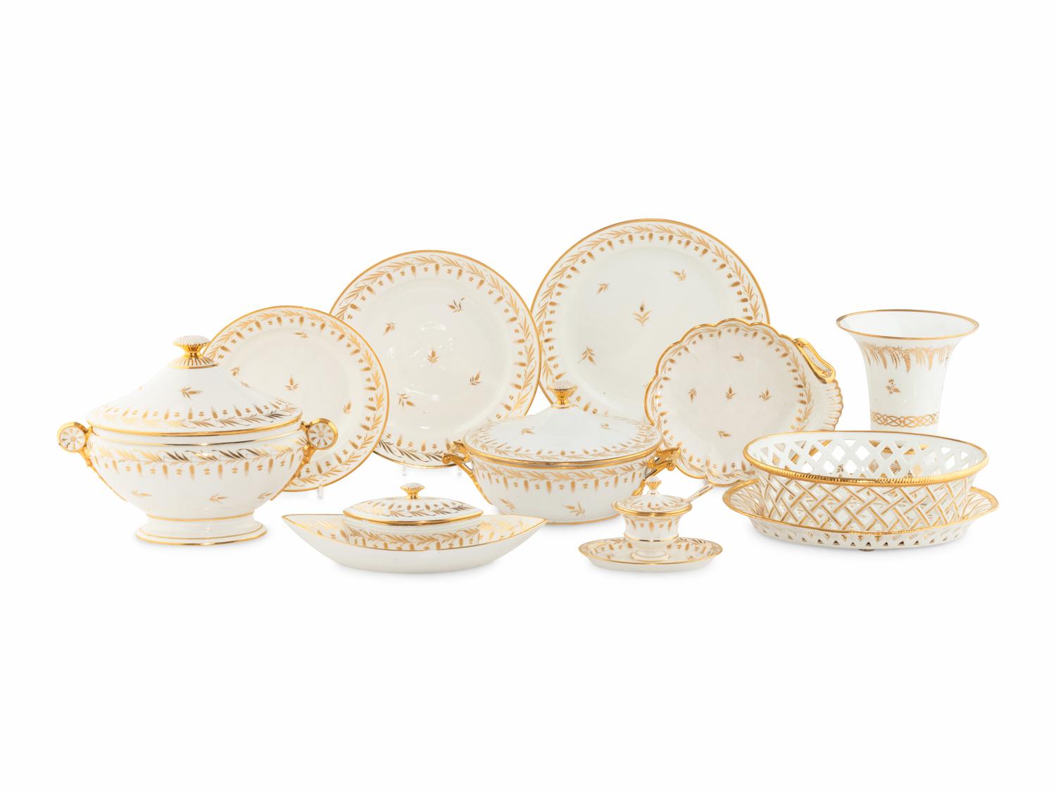 A Parcel-Gilt Porcelain Dinner Service