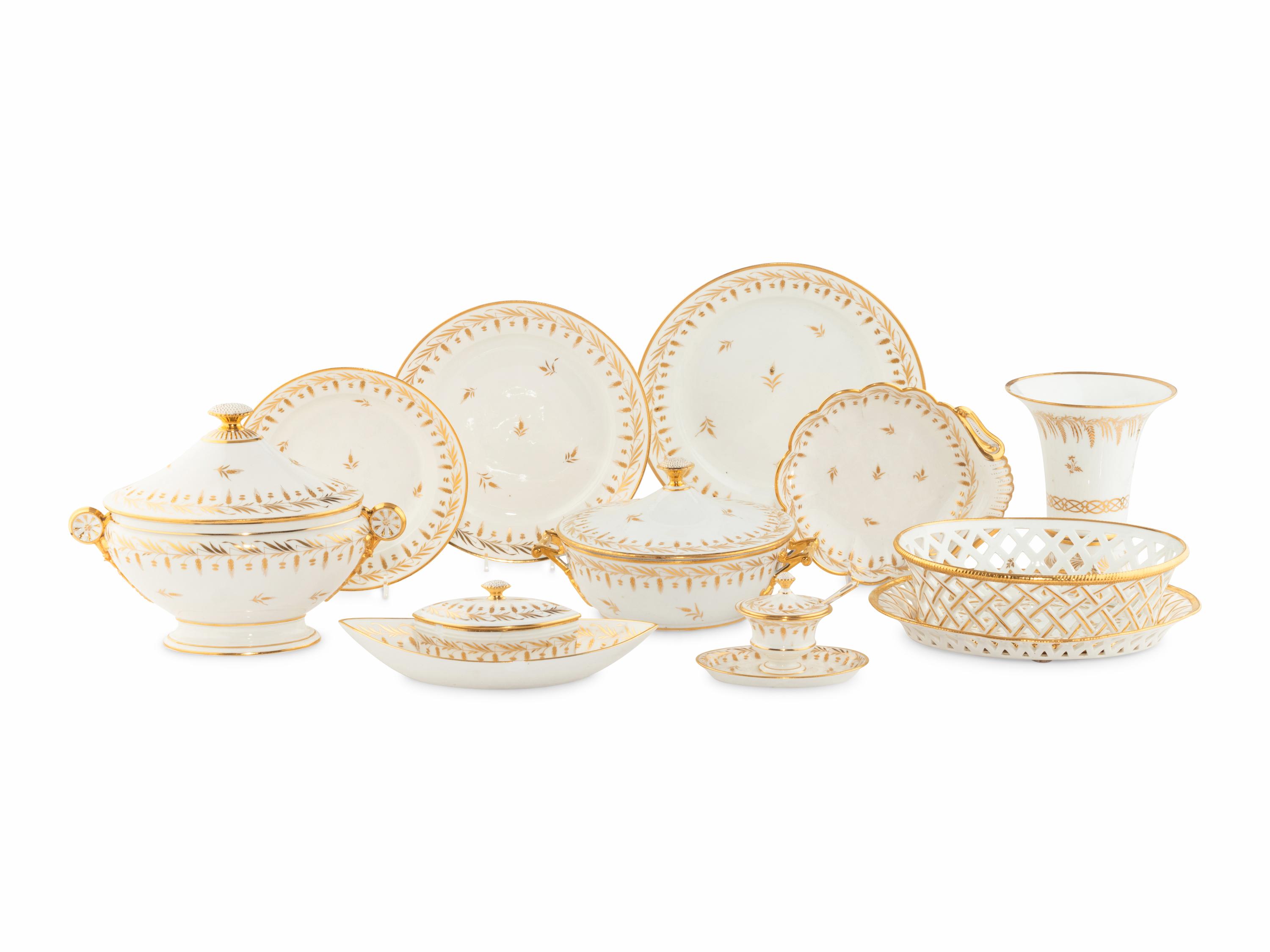 A Parcel-Gilt Porcelain Dinner Service