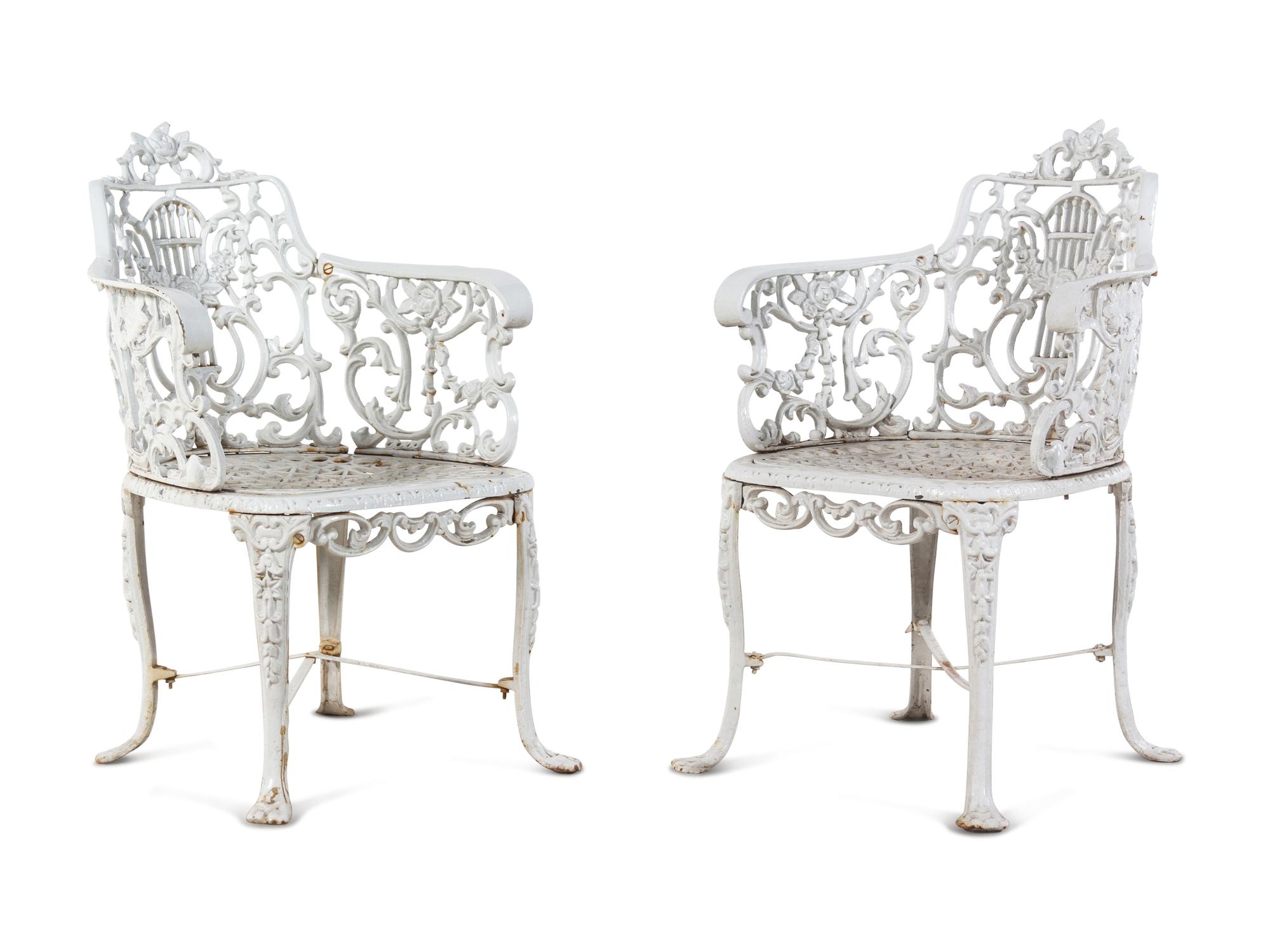 A Set of Eight Cast Metal Garden Armchairs