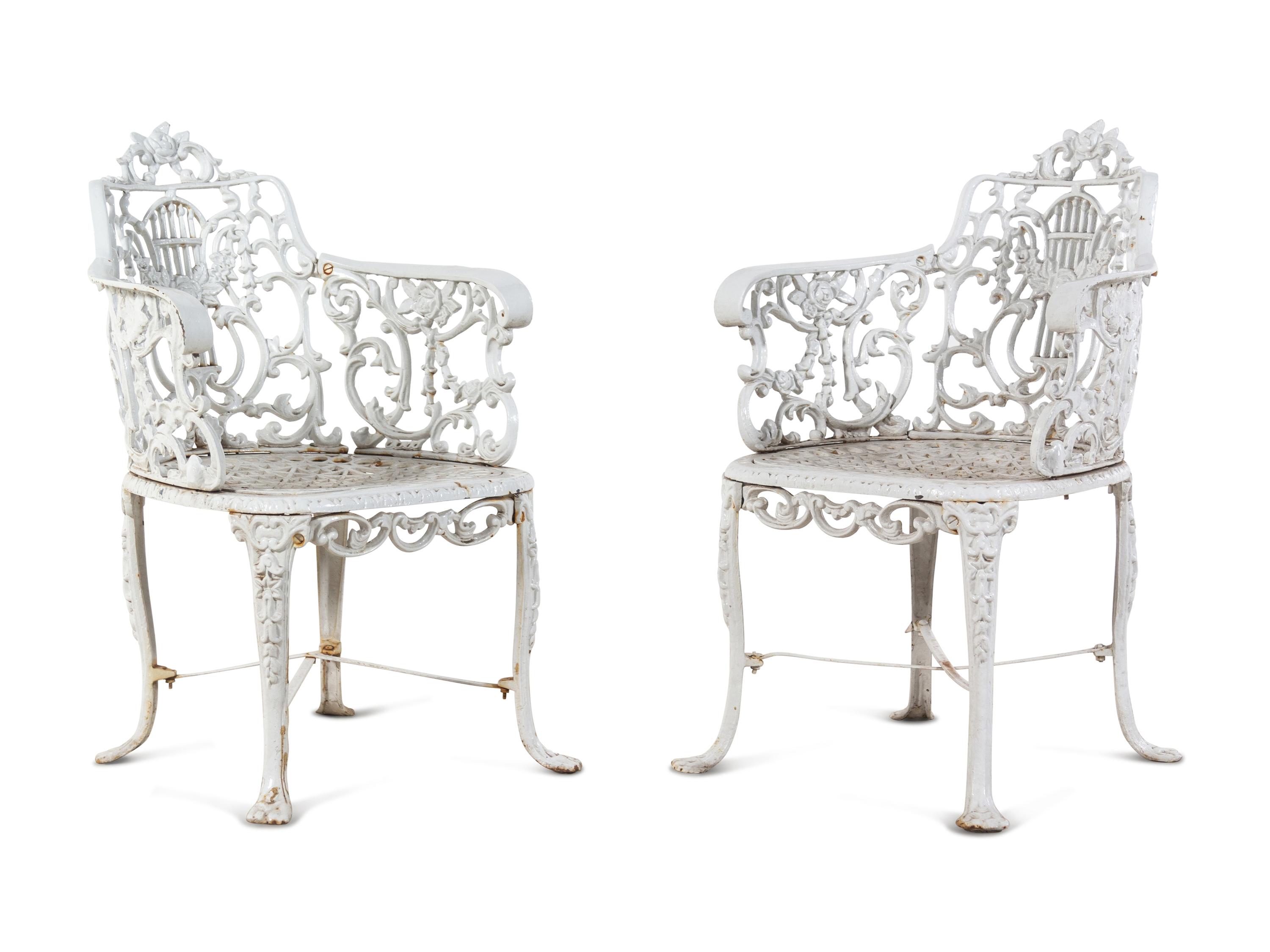 A Set of Eight Cast Metal Garden Armchairs