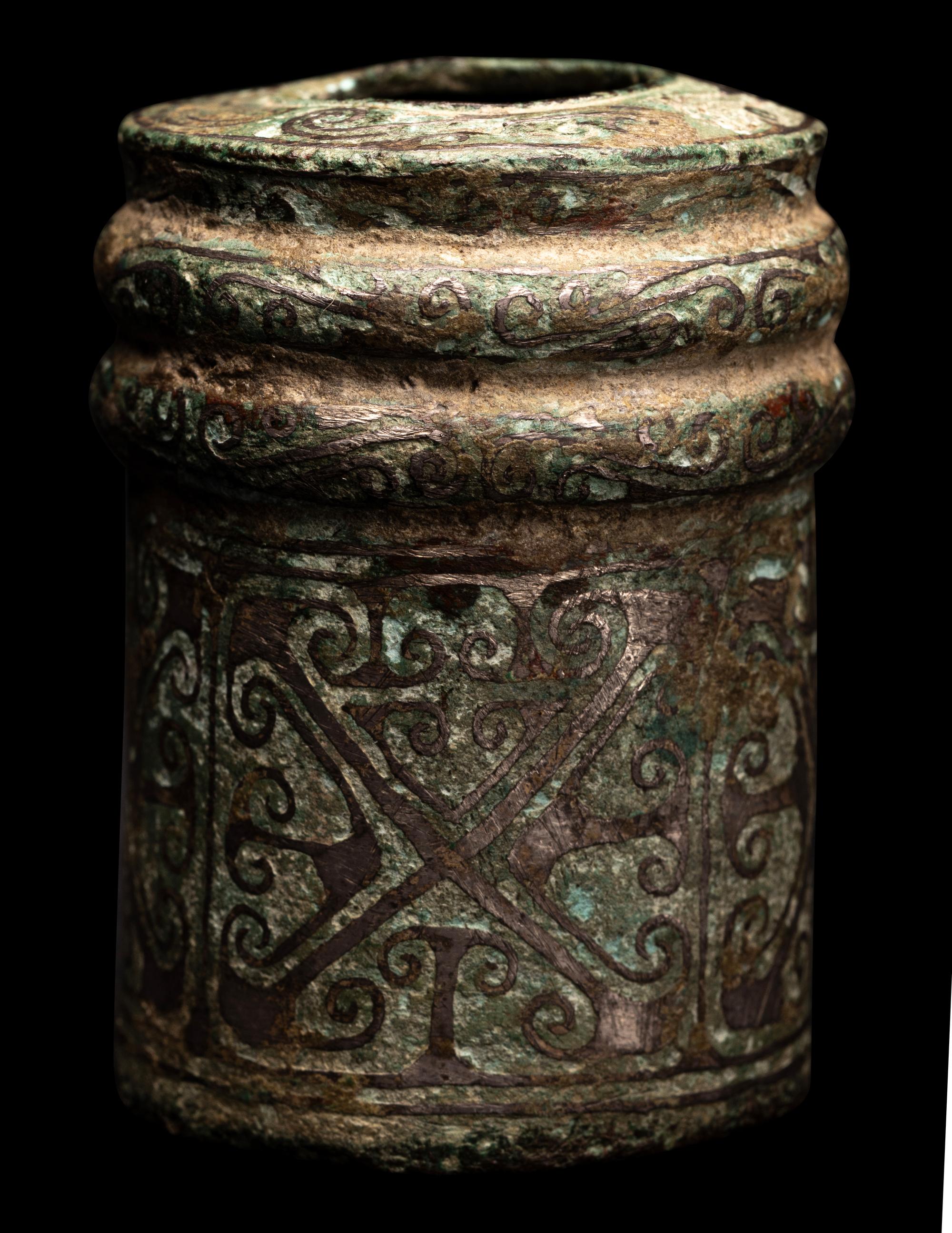 A Chinese Silver Inlaid Bronze Chariot Axle Fitting
