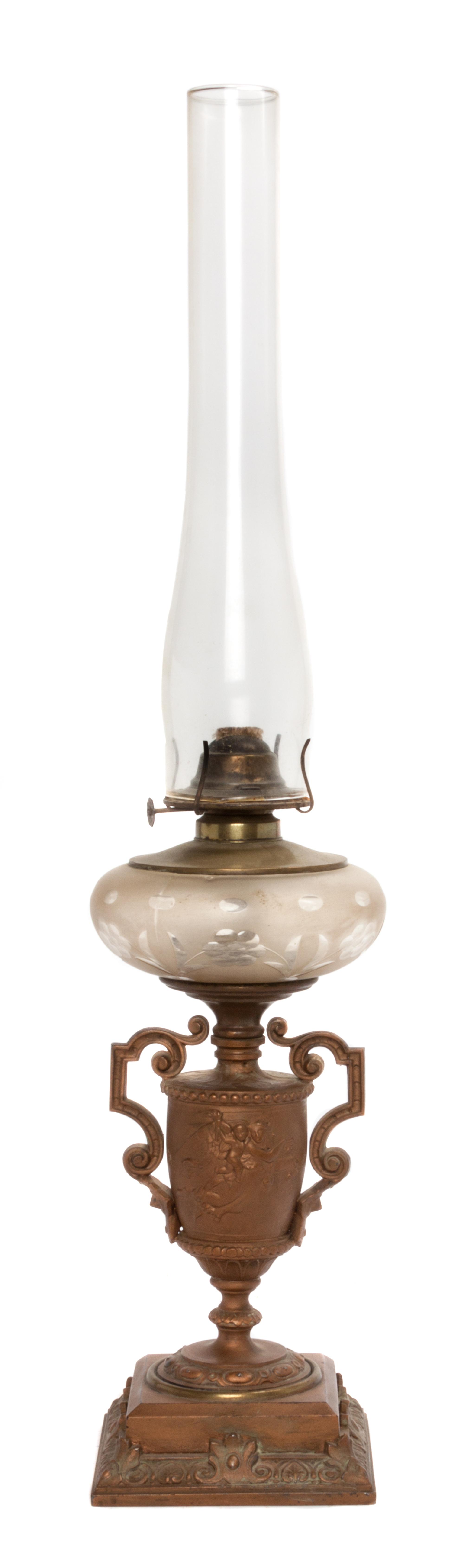 A Continental Neoclassical Gilt Metal Fluid Lamp Height overall 28 1/4 inches.