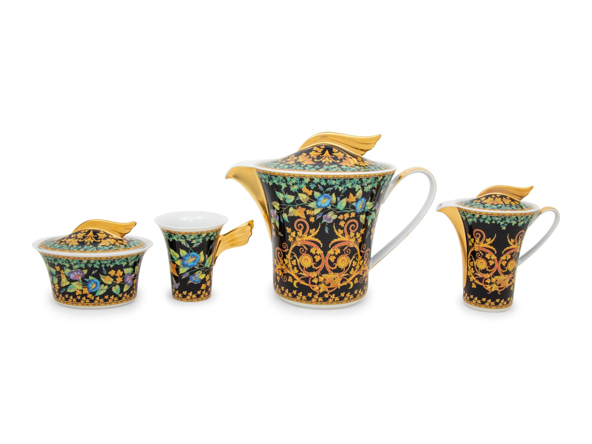 A Versace Gold Ivy Porcelain Dinner Service