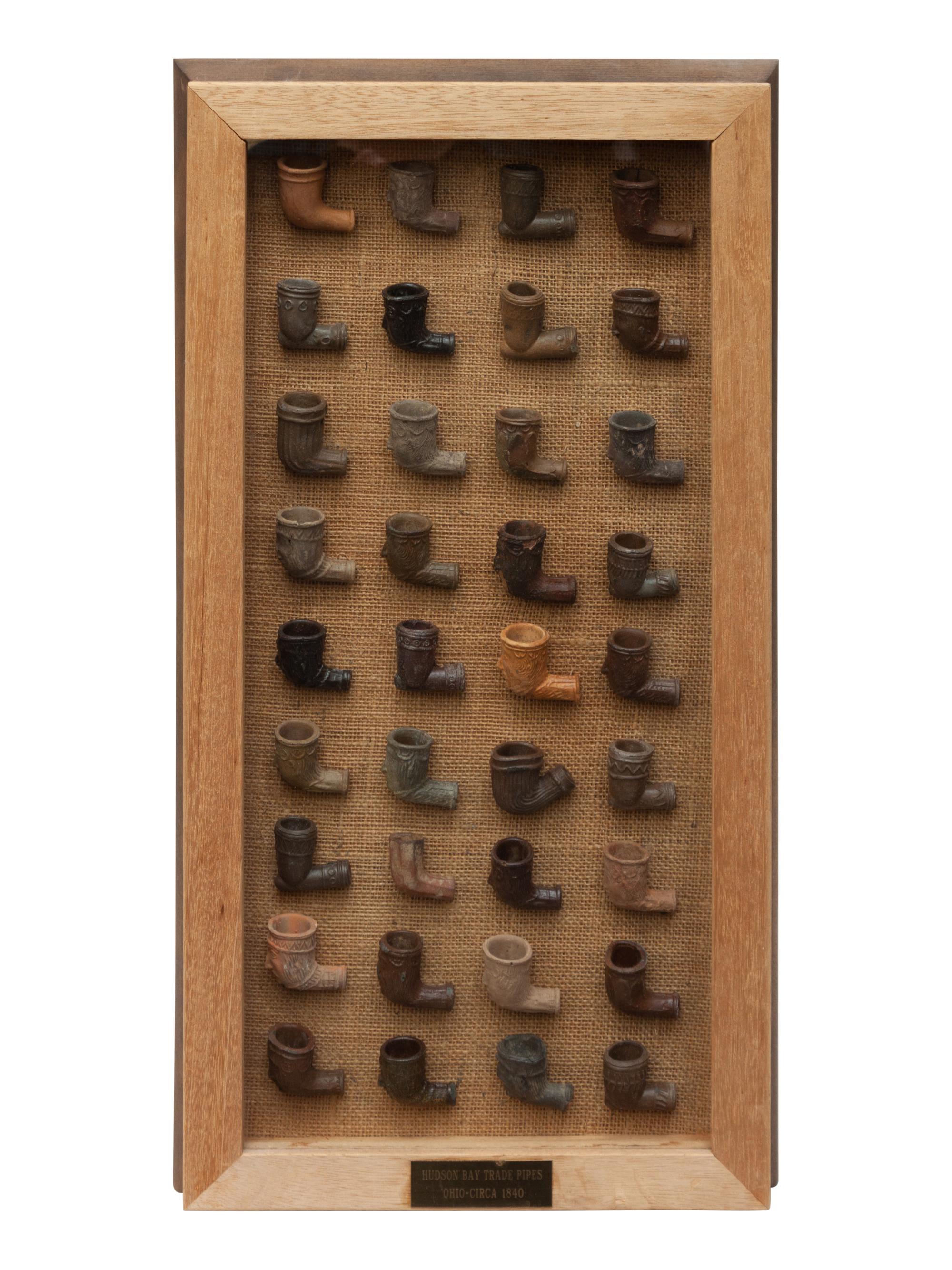 Four Framed Collections of Indian Chewing Gum, Tokio Tobacco Silks and Hudson Bay Trade Pipes