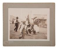 [OKLAHOMA]. Comanche Group on Main Street, Lawton, Ok . N.p.: N.p., ca 1900.