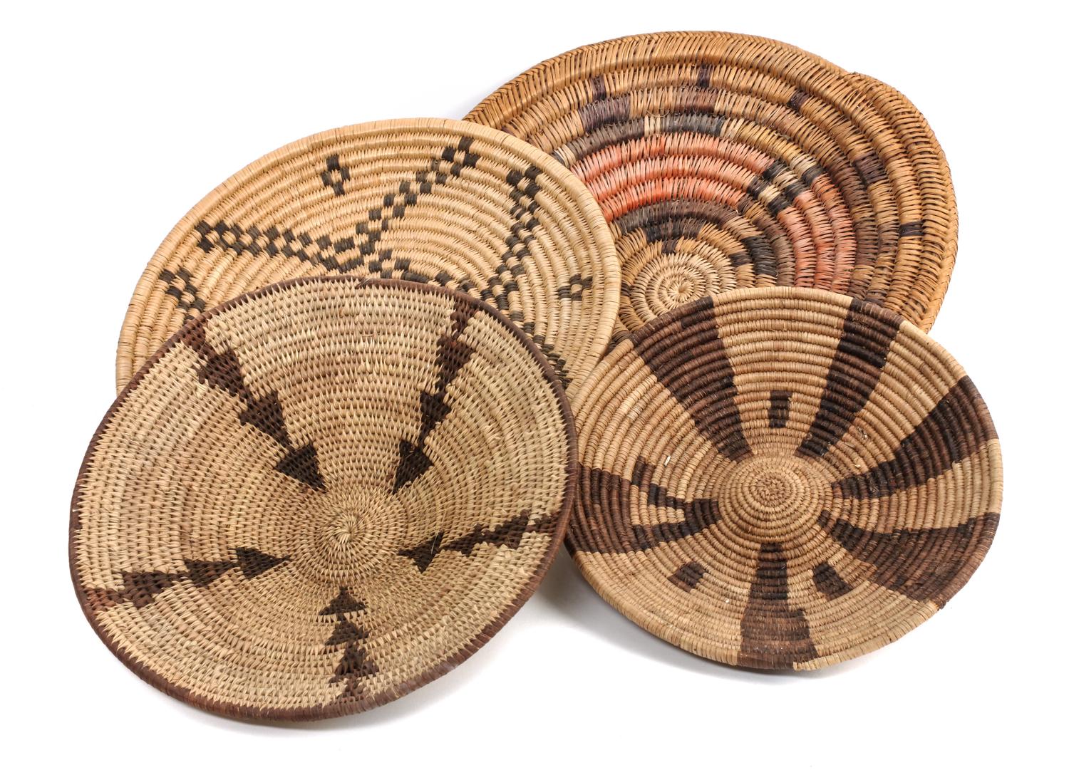 Four Southwestern Basket Trays Diameter of largest 13 1/2 inches.