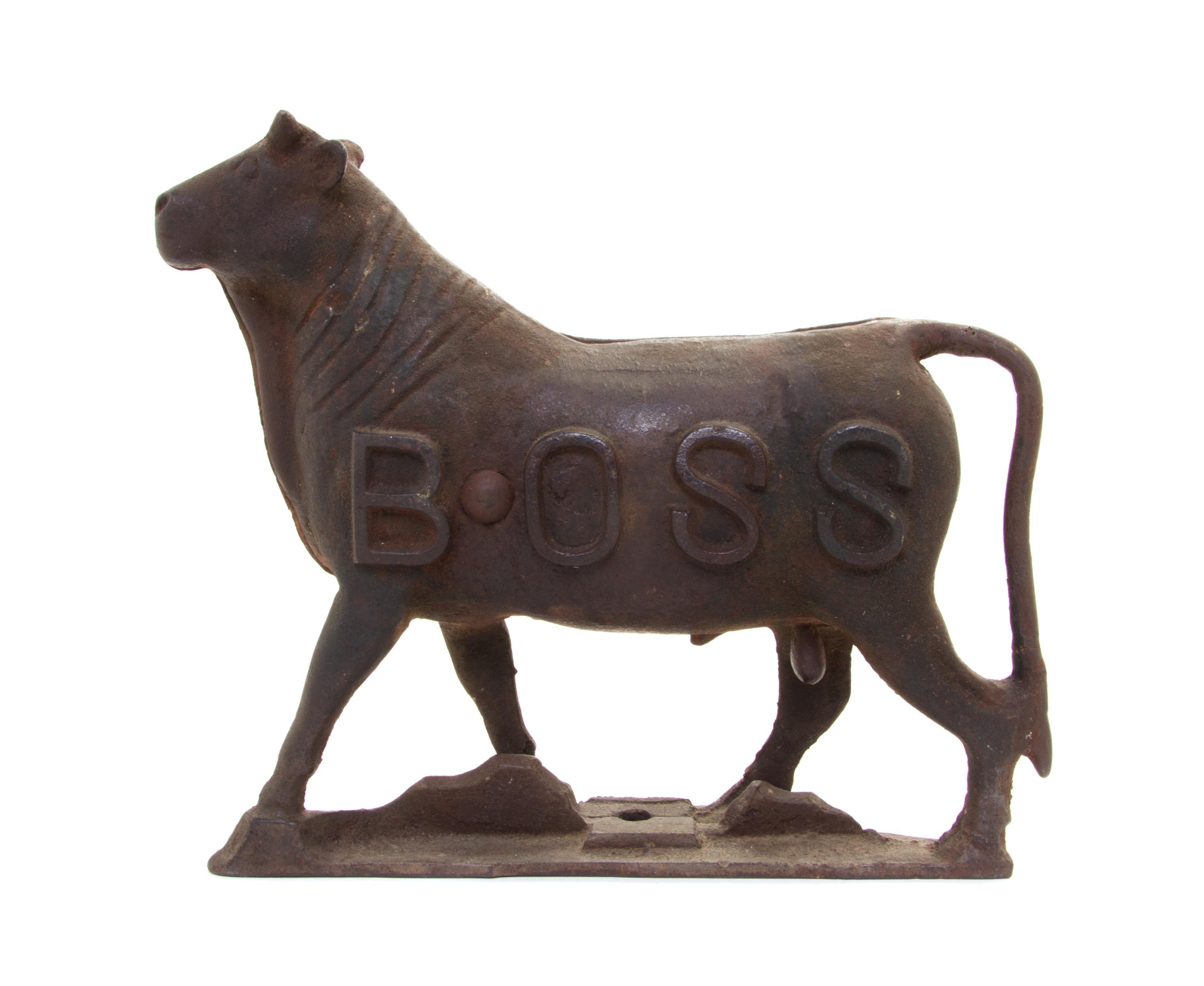 A Cast Iron Mill Weight Height 12 1/8 inches.