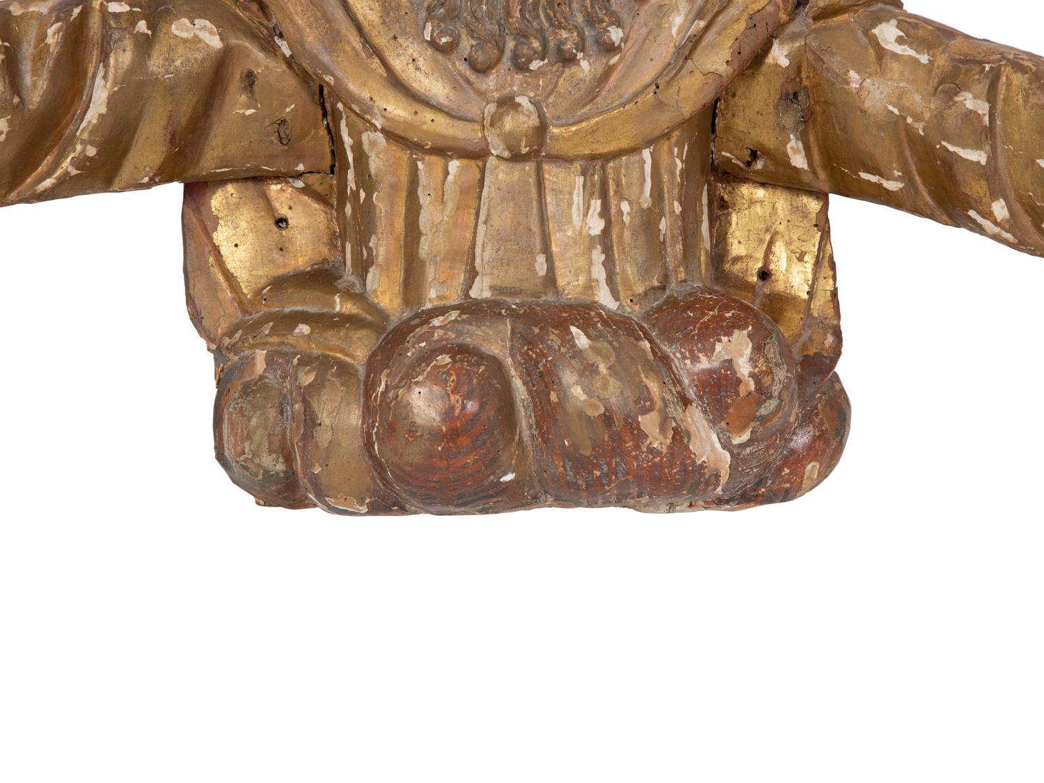 A Continental Painted and Parcel Gilt Carved Figure of a Saint with Outstretched Arms