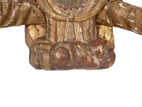 A Continental Painted and Parcel Gilt Carved Figure of a Saint with Outstretched Arms
