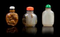 A Group of Three Agate Snuff Bottles POSSIBLY 19TH CENTURY Height of tallest 2 7/8 inches. — POSSIBLY 19TH CENTURY
