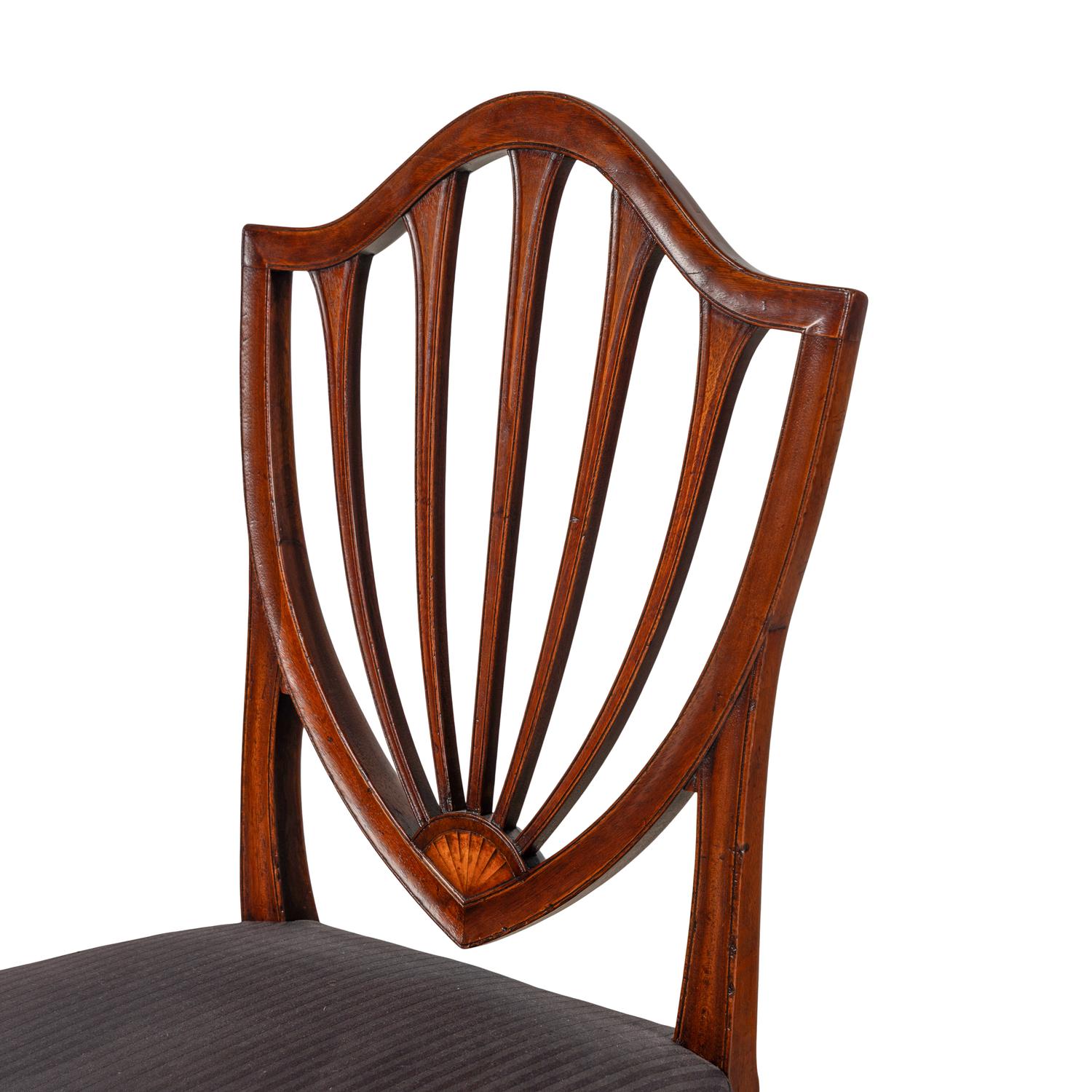 An Assembled Set of Five Mahogany Dining Chairs