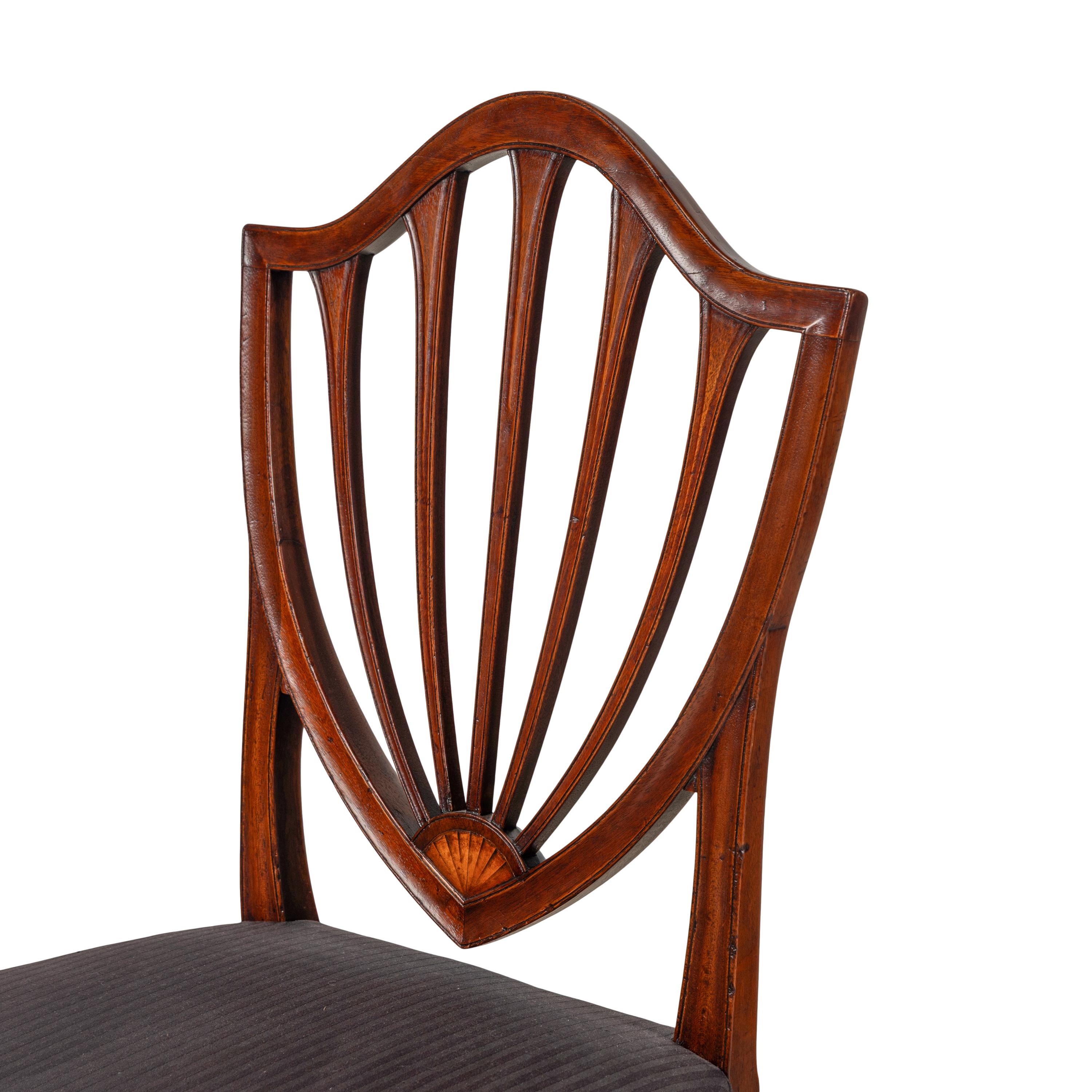 An Assembled Set of Five Mahogany Dining Chairs