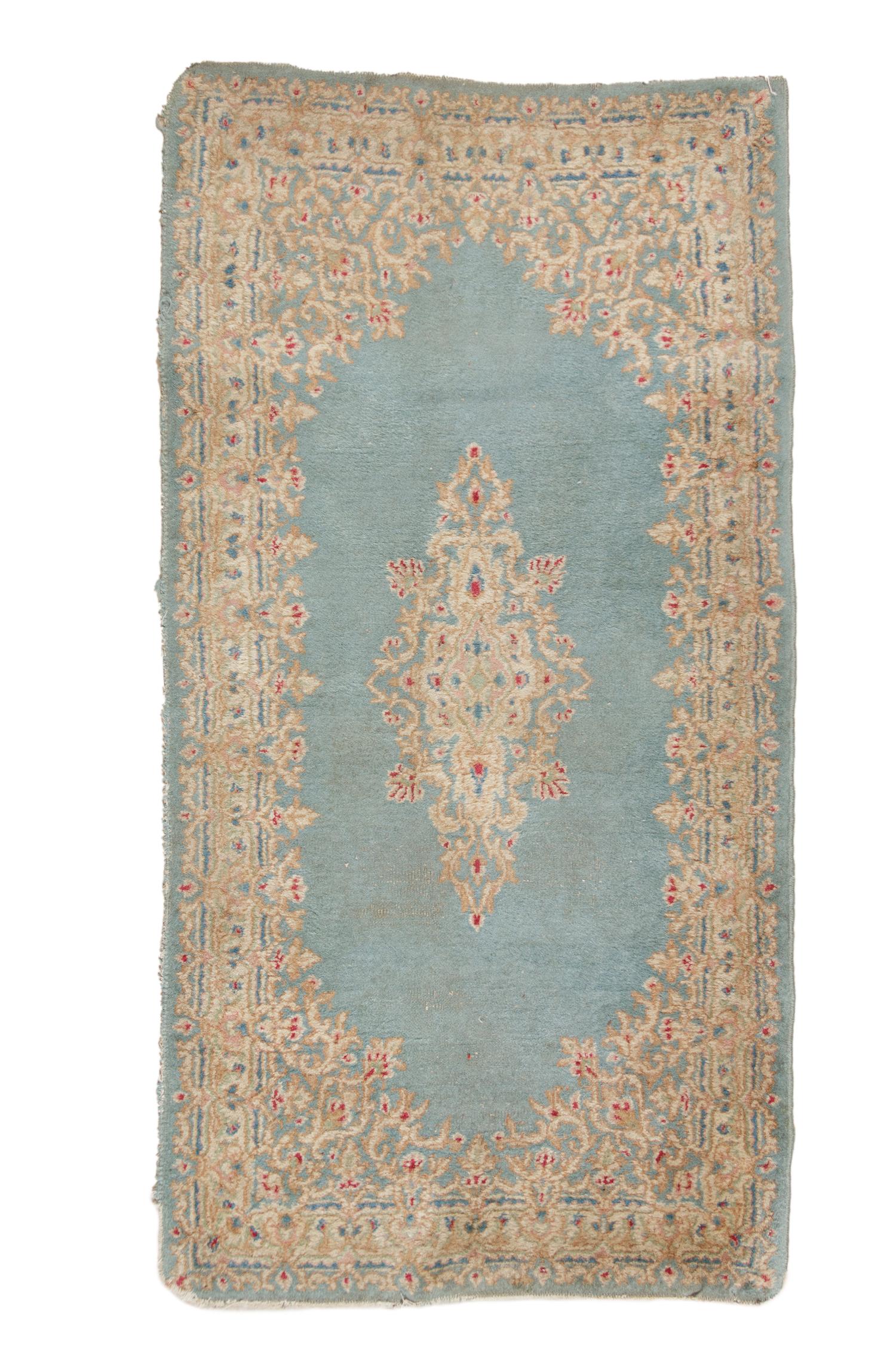 A Kirman Wool Rug