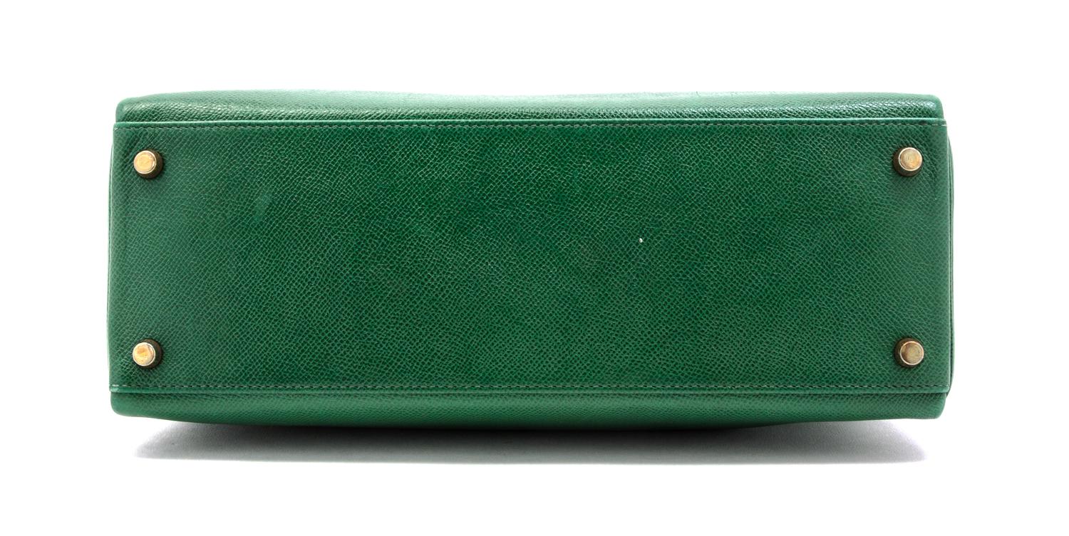 An Hermes 32cm Green Leather Kelly Bag, 12 1/2 x 9 x 4 1/2 inches.