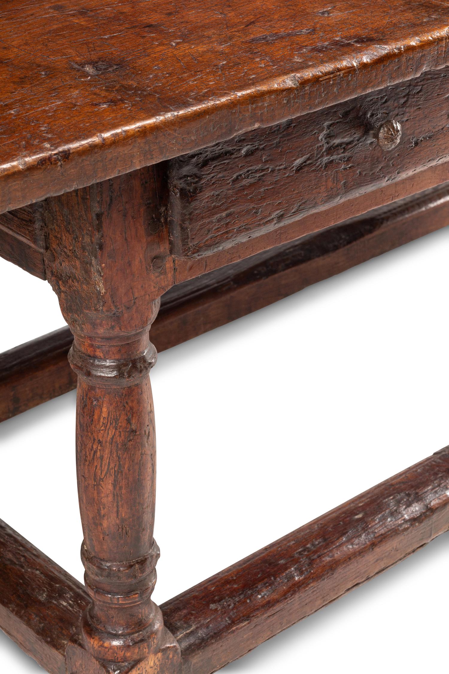 An Italian Baroque Walnut Table