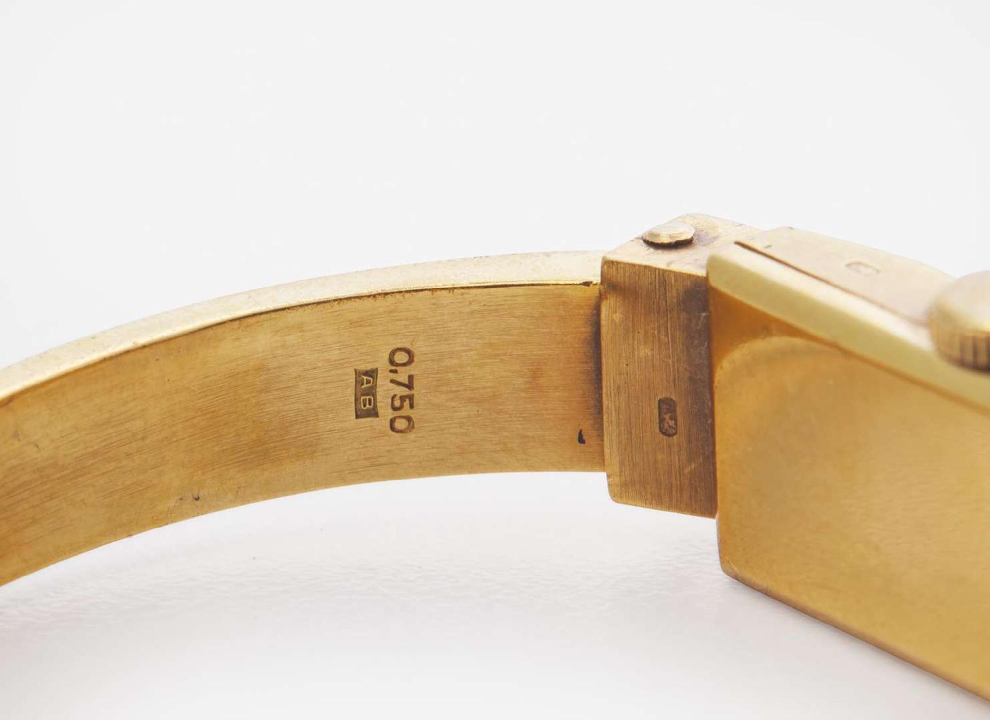 A Set of Two Vintage 18K Yellow Gold Bangle Watches
