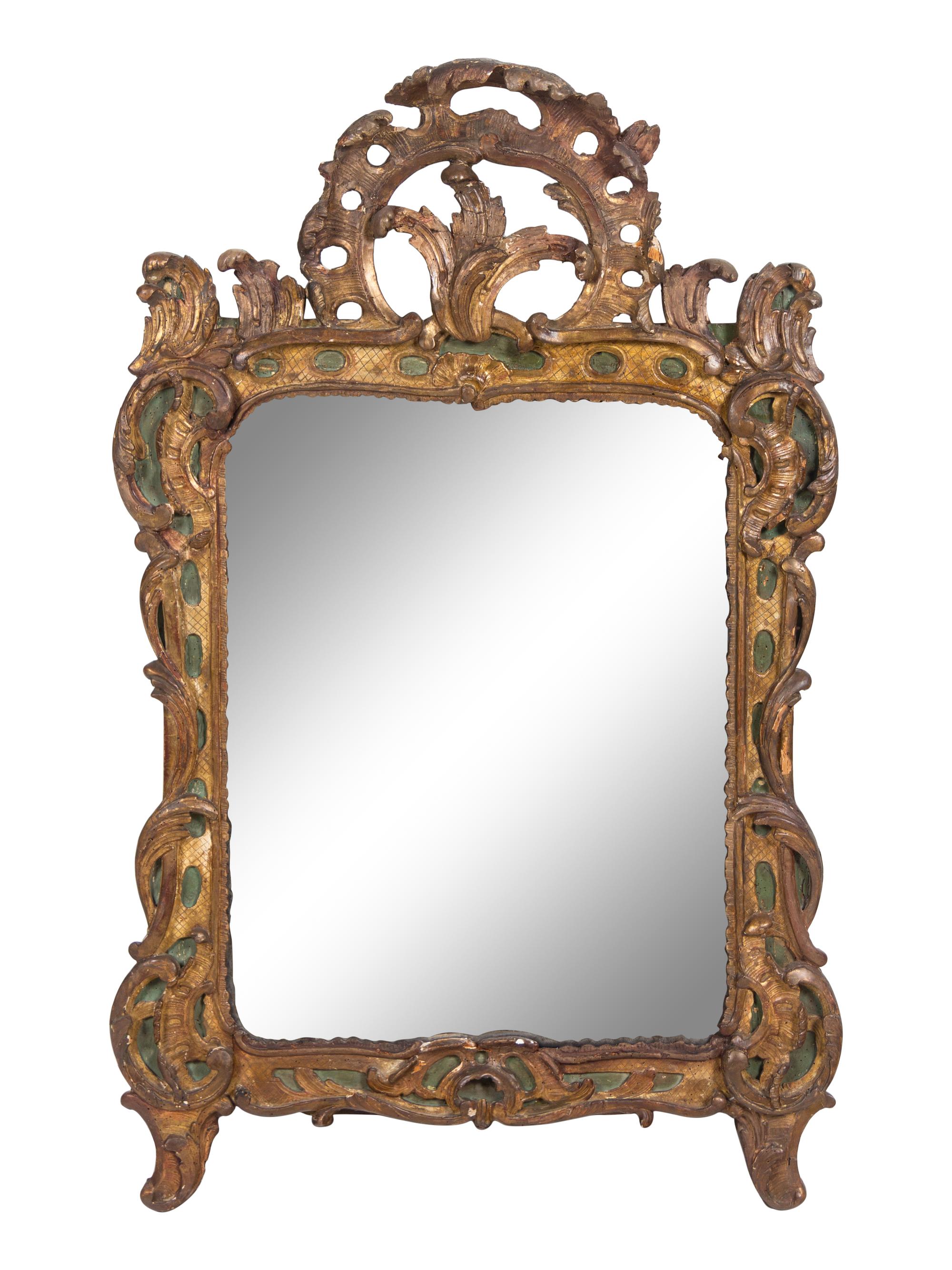 A Régence Carved and Painted Giltwood Mirror