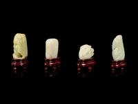 Four Chinese Jade Carvings of Fruits and Animals