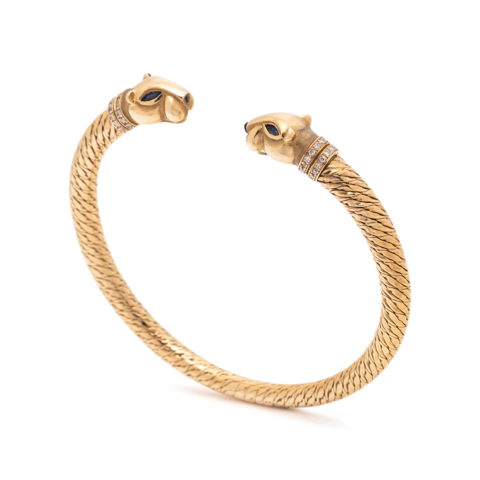 CARTIER, YELLOW GOLD, DIAMOND AND SAPPHIRE PANTHÈRE BANGLE BRACELET