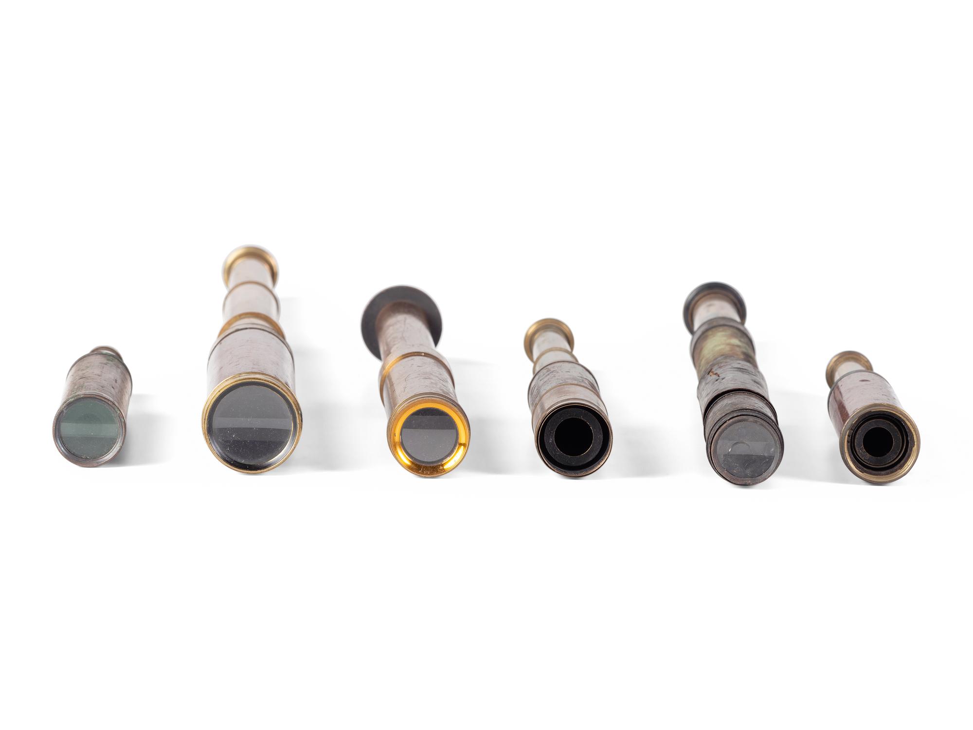 A group of 6 handheld telescopes found in the workshop of George W. Fitz, Peconic, New York.