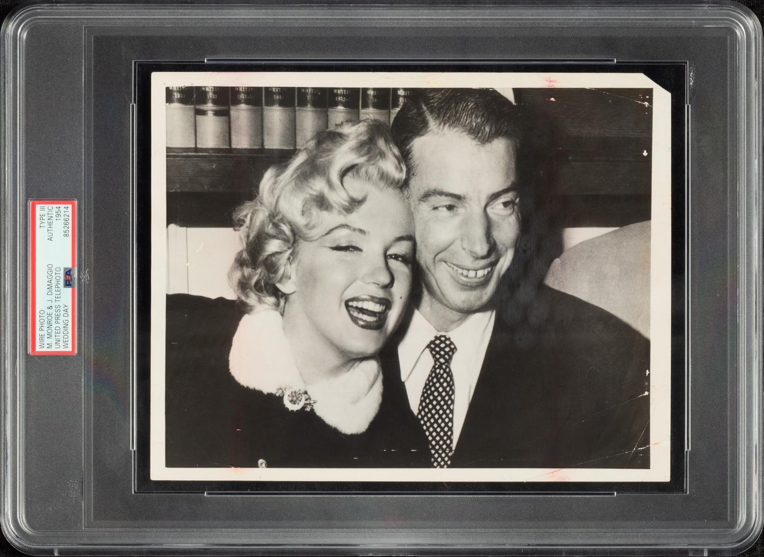 An Original Joe DiMaggio and Marilyn Monroe Wedding Day News Photograph (PSA Type III Authentic)