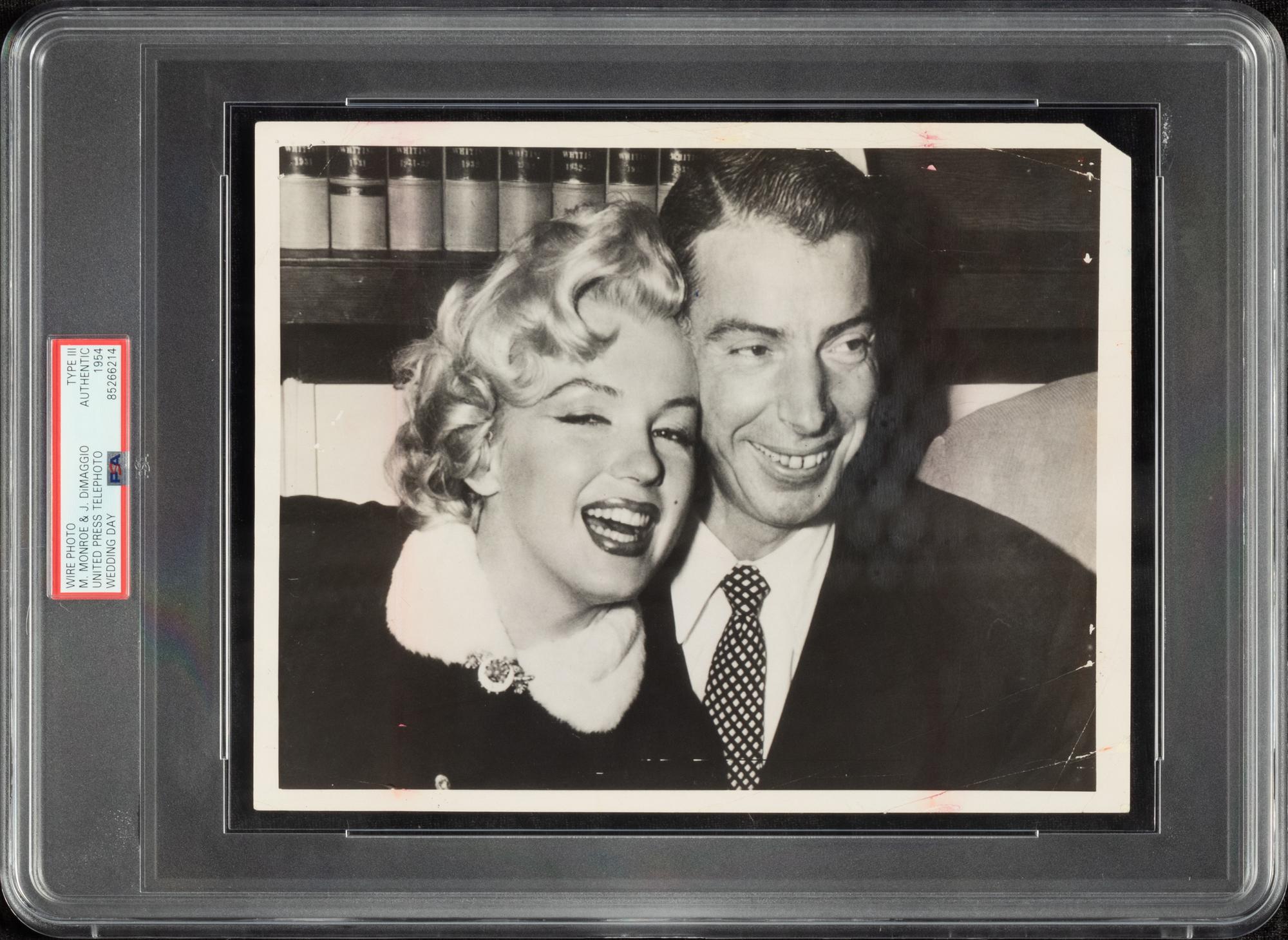 An Original Joe DiMaggio and Marilyn Monroe Wedding Day News Photograph (PSA Type III Authentic)