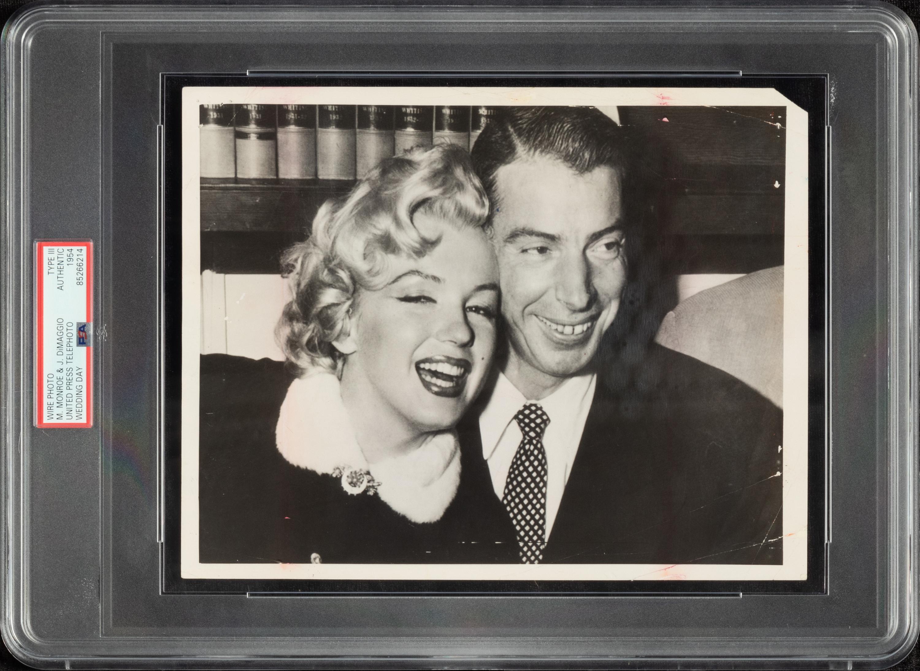 An Original Joe DiMaggio and Marilyn Monroe Wedding Day News Photograph (PSA Type III Authentic)